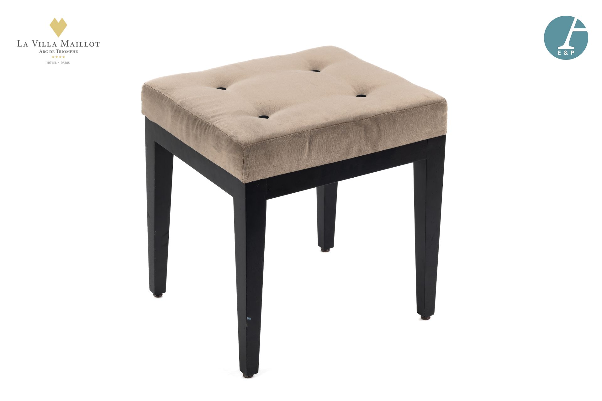 Null Upholstered stool on four blackened wood legs, upholstered in beige fabric.&hellip;