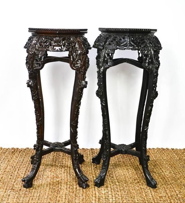 Null Two similar Chinese jardinere stands, the hardwood carved octagonal tops in&hellip;