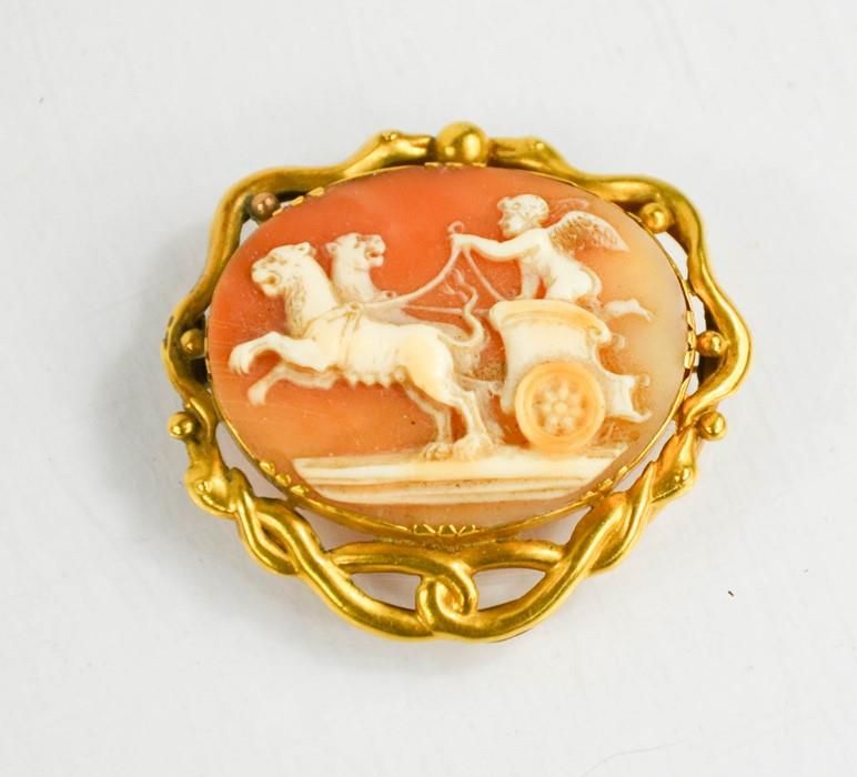 Null A gilt metal cameo brooch, of oval form, depicting cherub in chariot lead b&hellip;