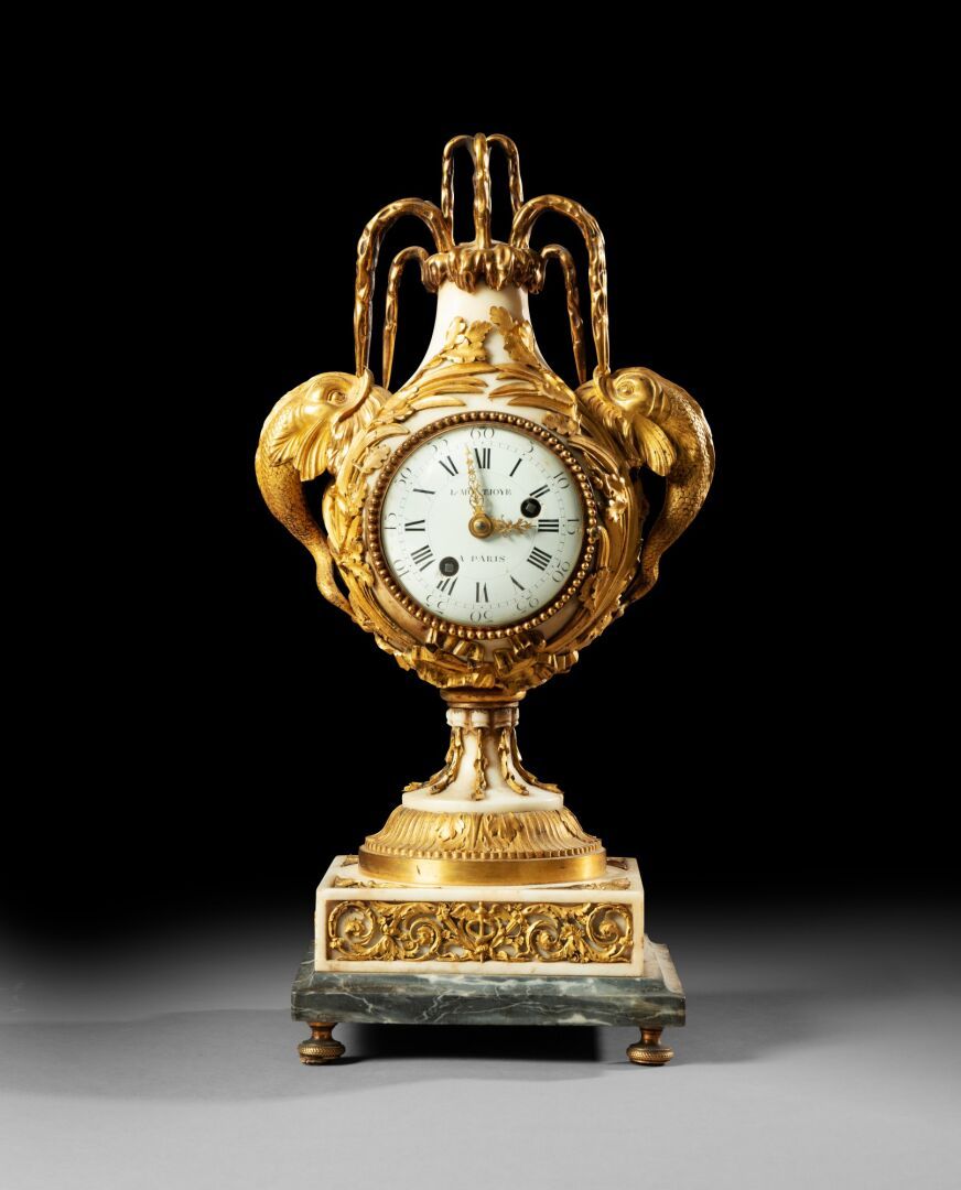 Null Marble and gilt bronze clock 

Louis XVI period, circa 1780, after a model &hellip;