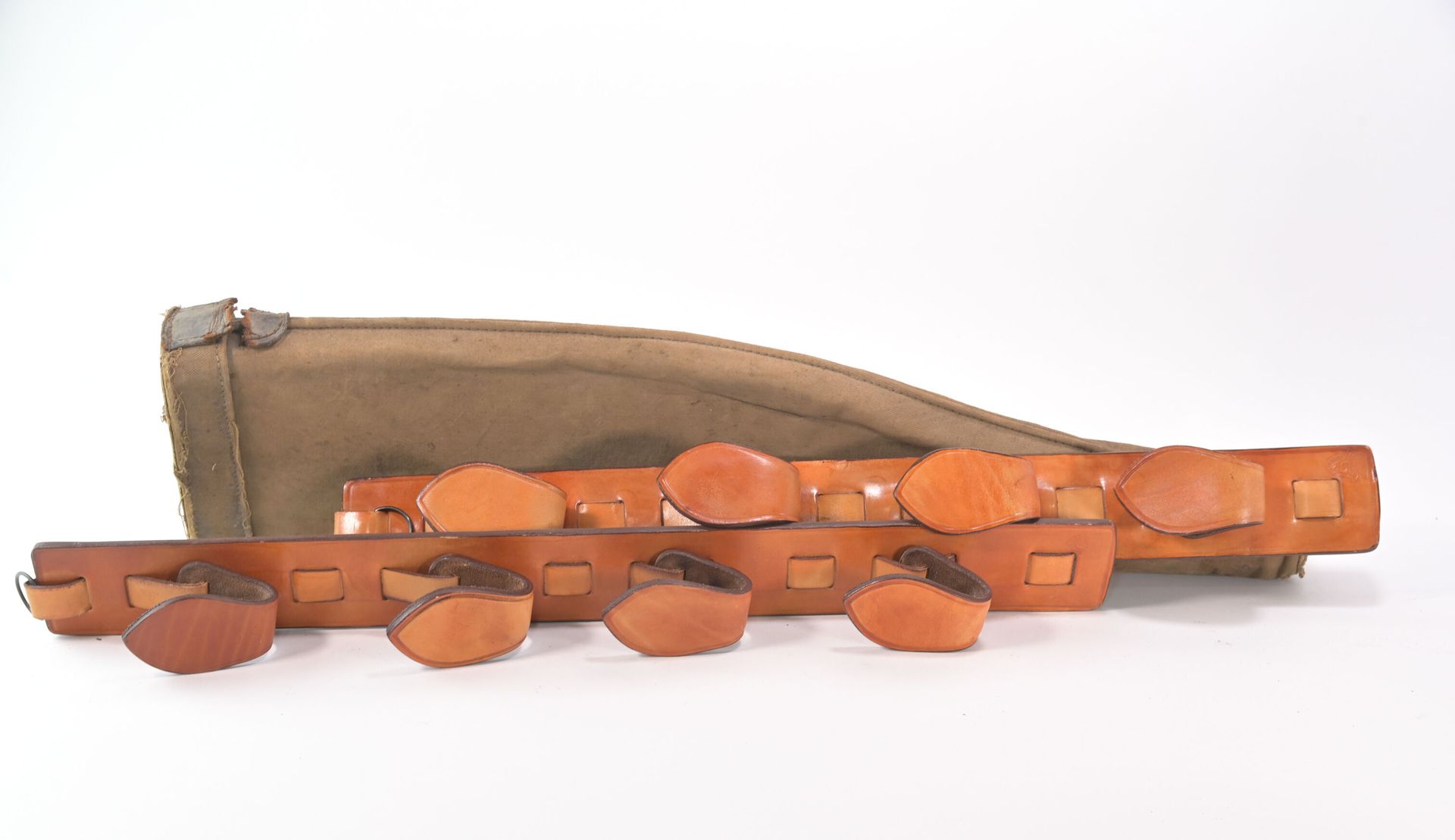 Null Lot:
Fawn leather rifle rack
We joined a canvas rifle cover