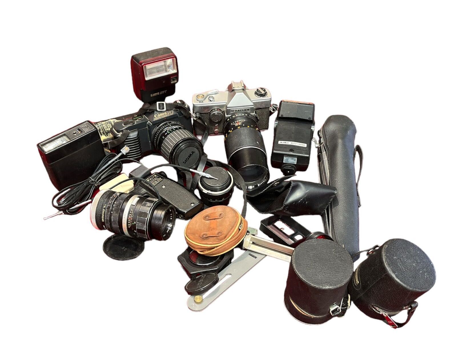 Null Conjunto de cámaras incluyendo canon, objetivos y varios.