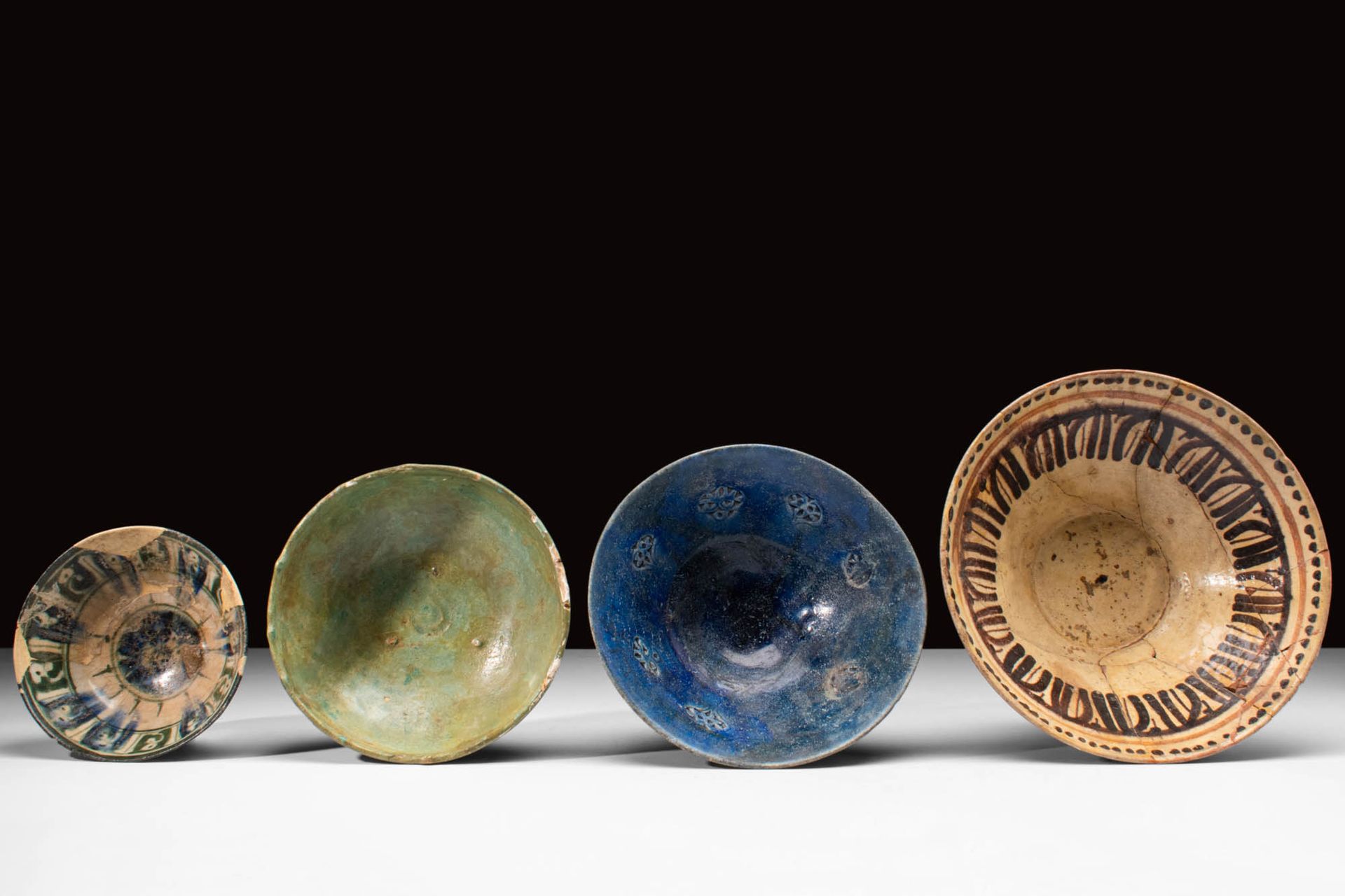 FOUR MEDIEVAL SELJUK GLAZED VESSELS Ca. AD 900 - 1300.
A collection of four Isla&hellip;