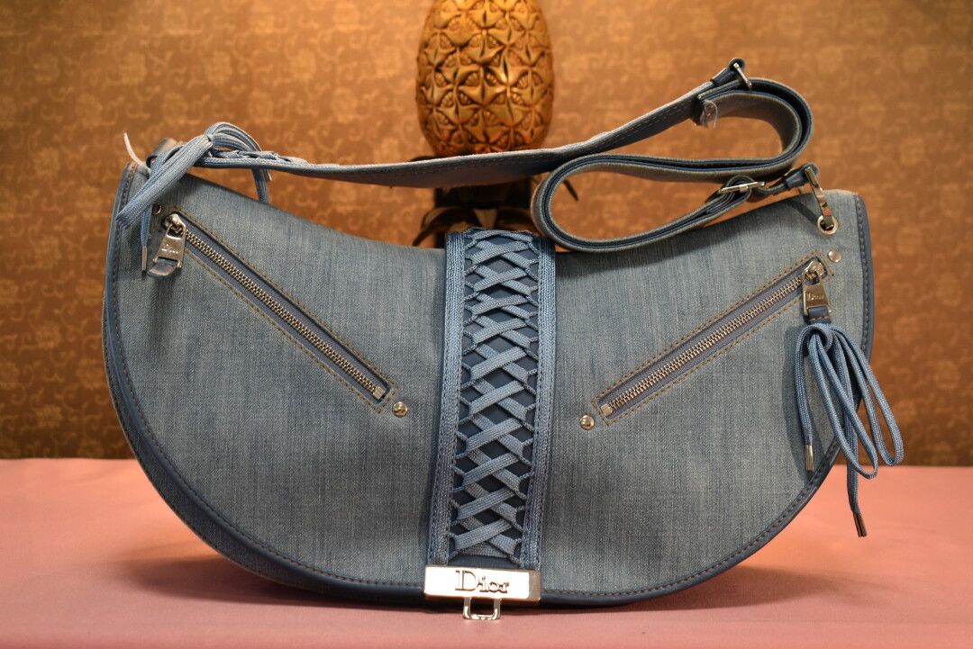 Null CHRISTIAN DIOR. Half moon bag in cotton canvas like jeans, closing by snap &hellip;