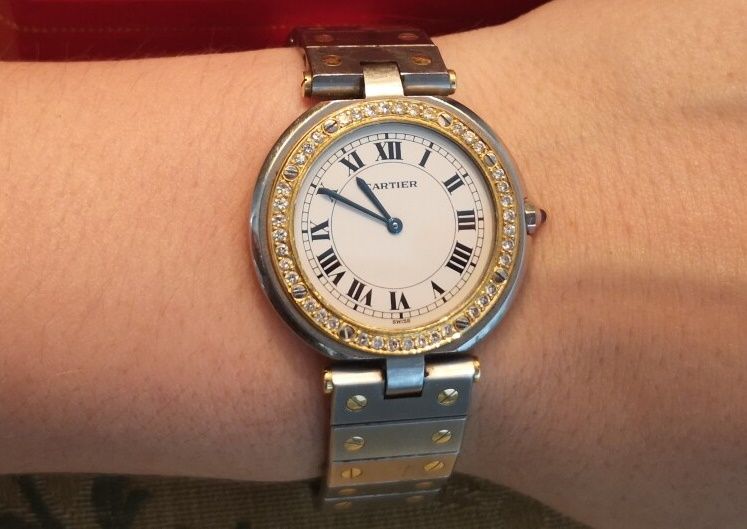 Null Cartier. Modell Santos. Uhr aus Stahl (14,90 g), Gold (2,80 g) und Brillant&hellip;