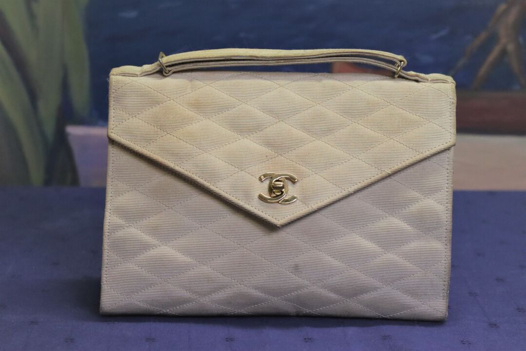 At Auction: Chanel Quilted Lambskin Timeless Clutch