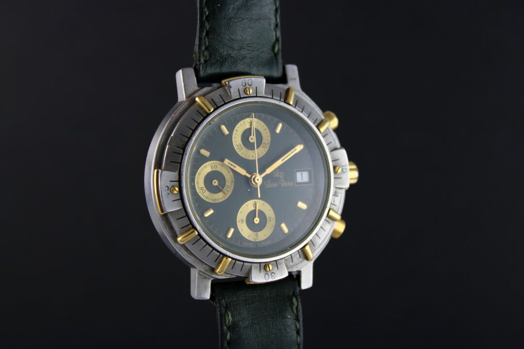 Null Lucien Rochat ref.21.100.022
钢制手镯手表。圆形表壳，外圈有刻度，金质跳线。螺钉固定的表壳背面。
绿色表盘，黄金小表盘，3&hellip;