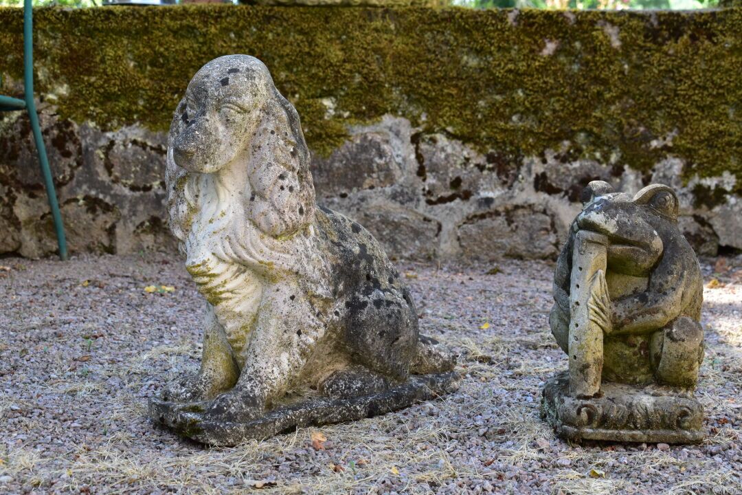 Null Meeting of a dog and a frog with a flute in carved stone. Height of the dog&hellip;