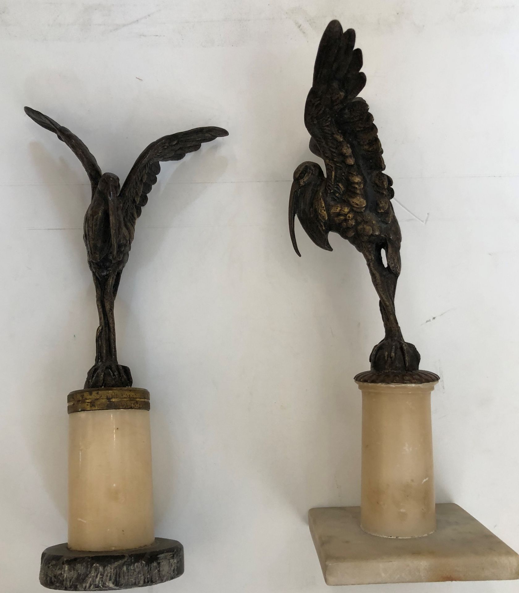 Null Lot of two BRONZE finely chiseled representing a pelican with spread wings,&hellip;