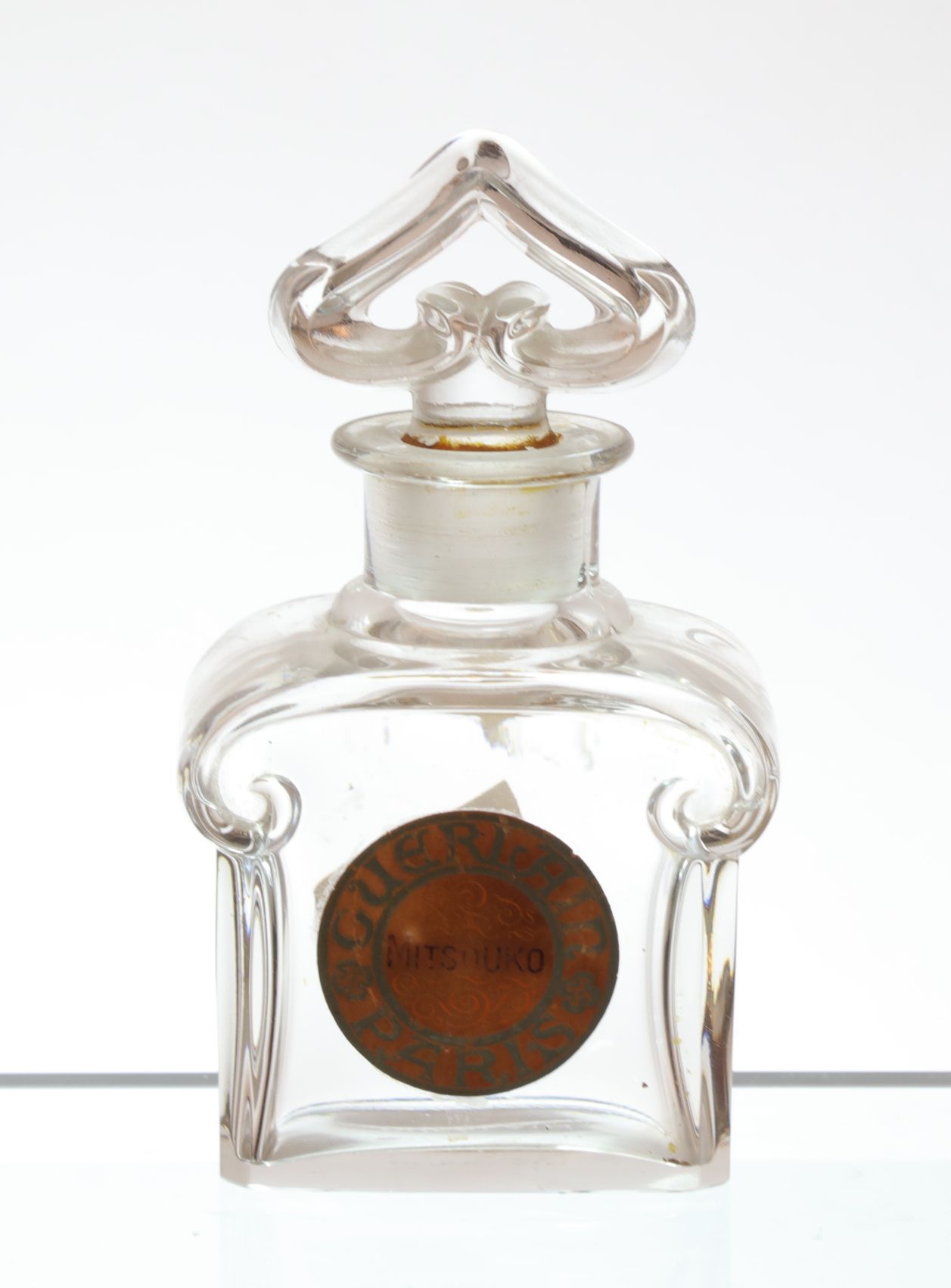 Null BACCARAT, GUERLAIN, Mitsuko, perfume bottle in crystal, signed (ht : 12cm).
