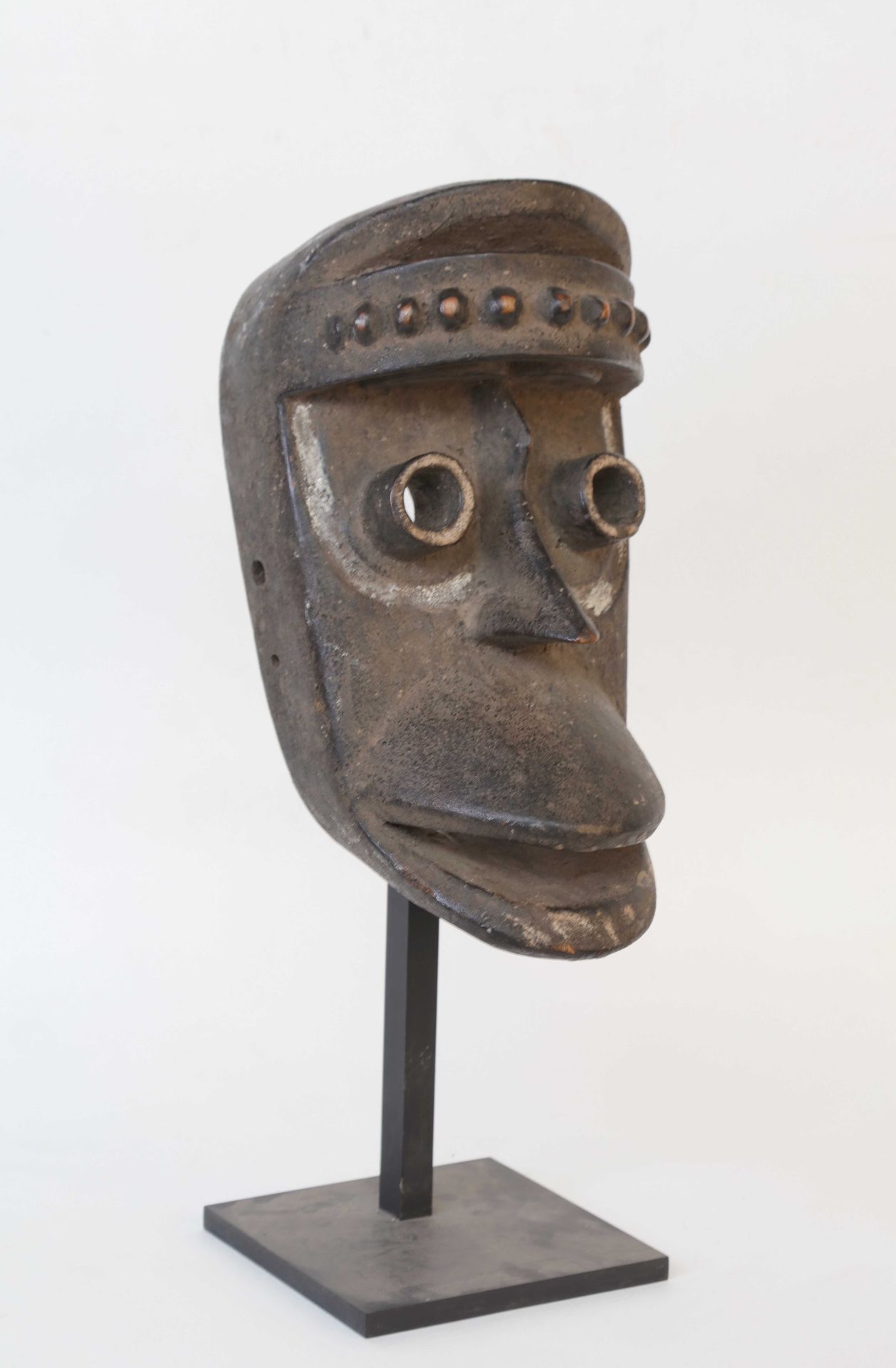 Null DAN, Ivory Coast. Anthropo-zoomorphic mask, the frond in visor, the tubular&hellip;