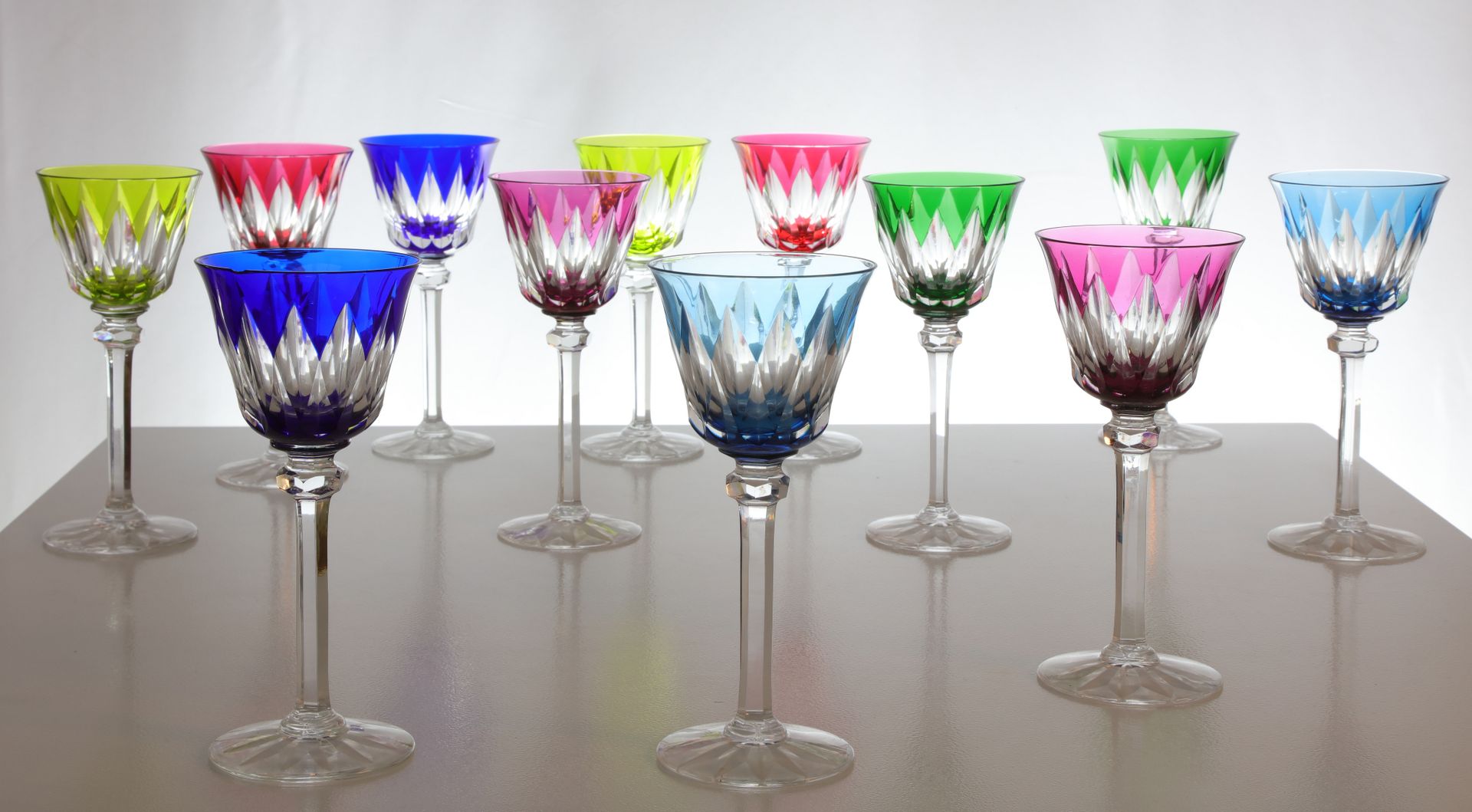 Null SAINT-LOUIS, 11 glasses on foot, color, A chipped glass is attached. Height&hellip;