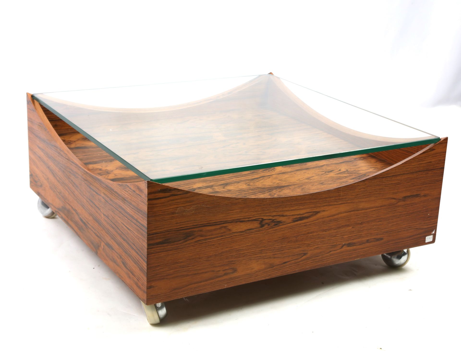 Null BRAMIN, coffee table in rosewood veneer, and glass top, on casters.67X68