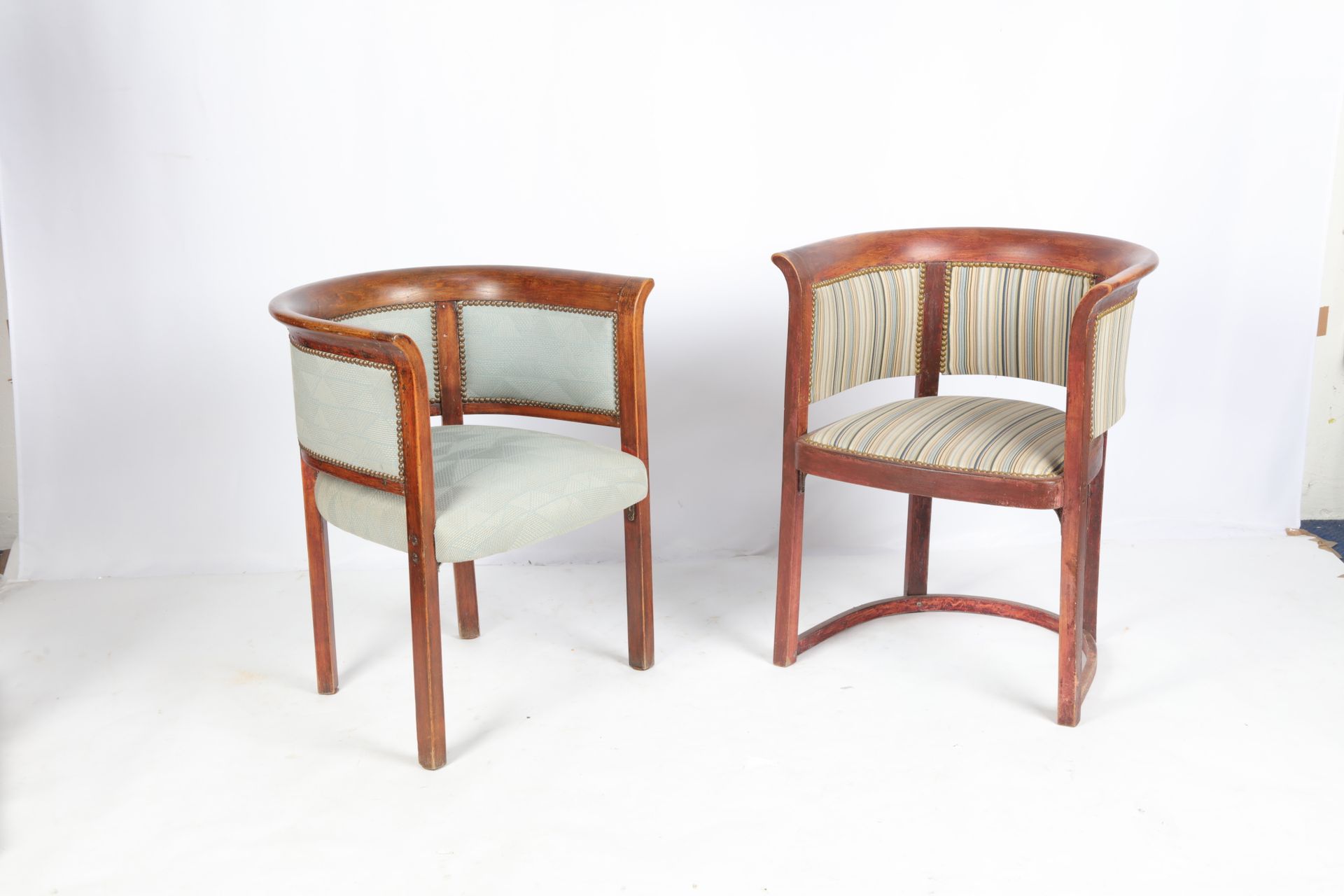 Null Pair of gondola armchairs in natural wood, Viennese work. (one with a space&hellip;