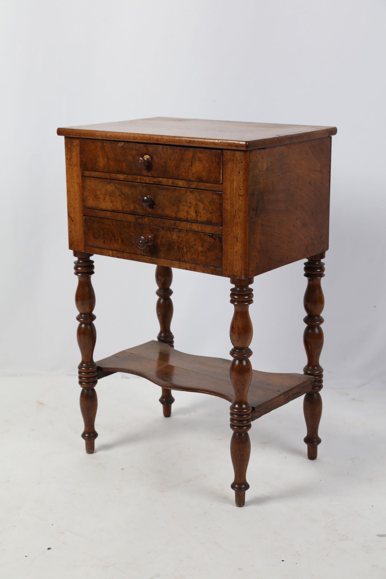 Null Walnut burr veneer middle table, three drawers, ringed legs, top. Louis-Phi&hellip;