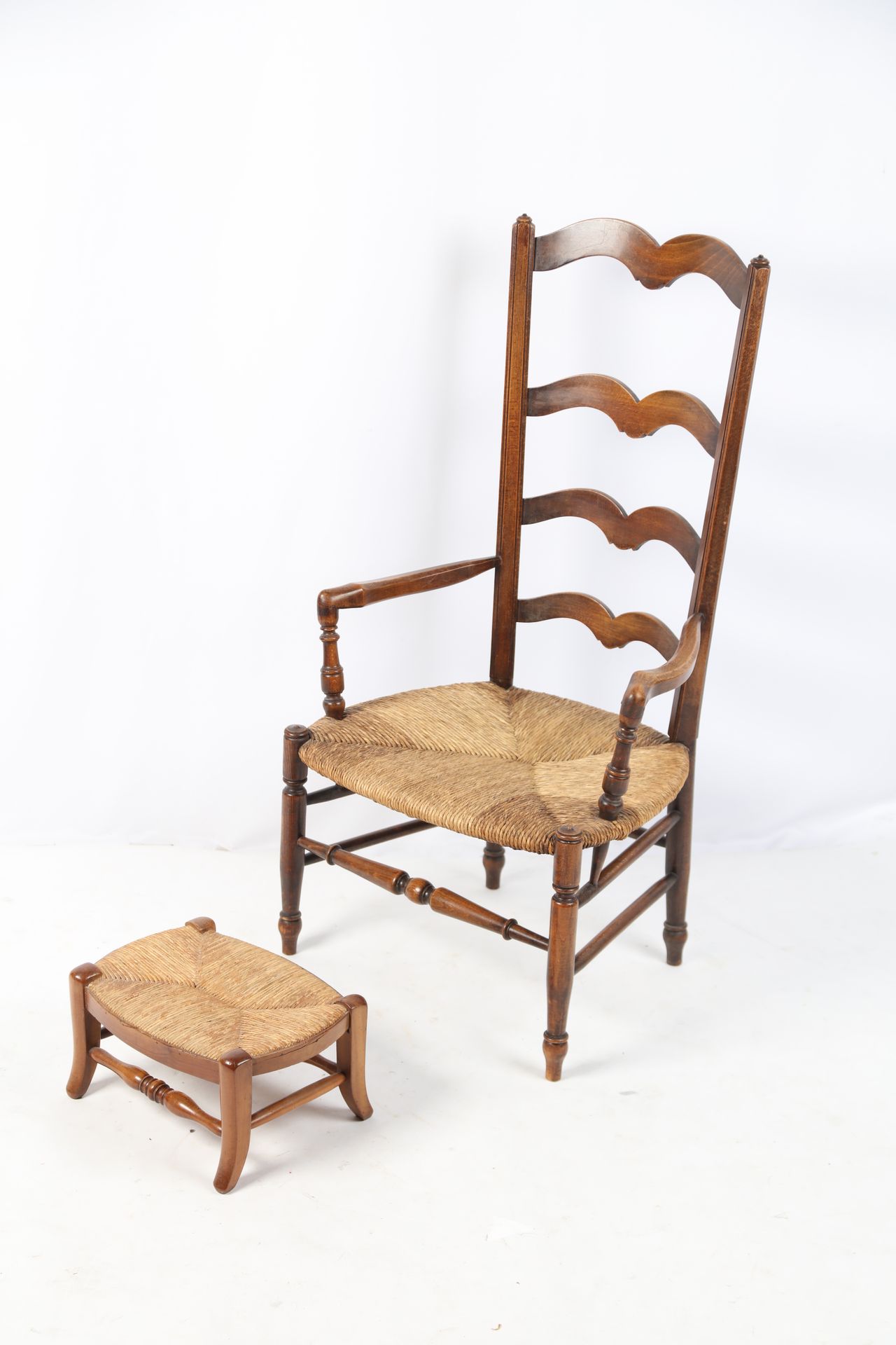 Null Natural wood armchair and footstool, provincial work.