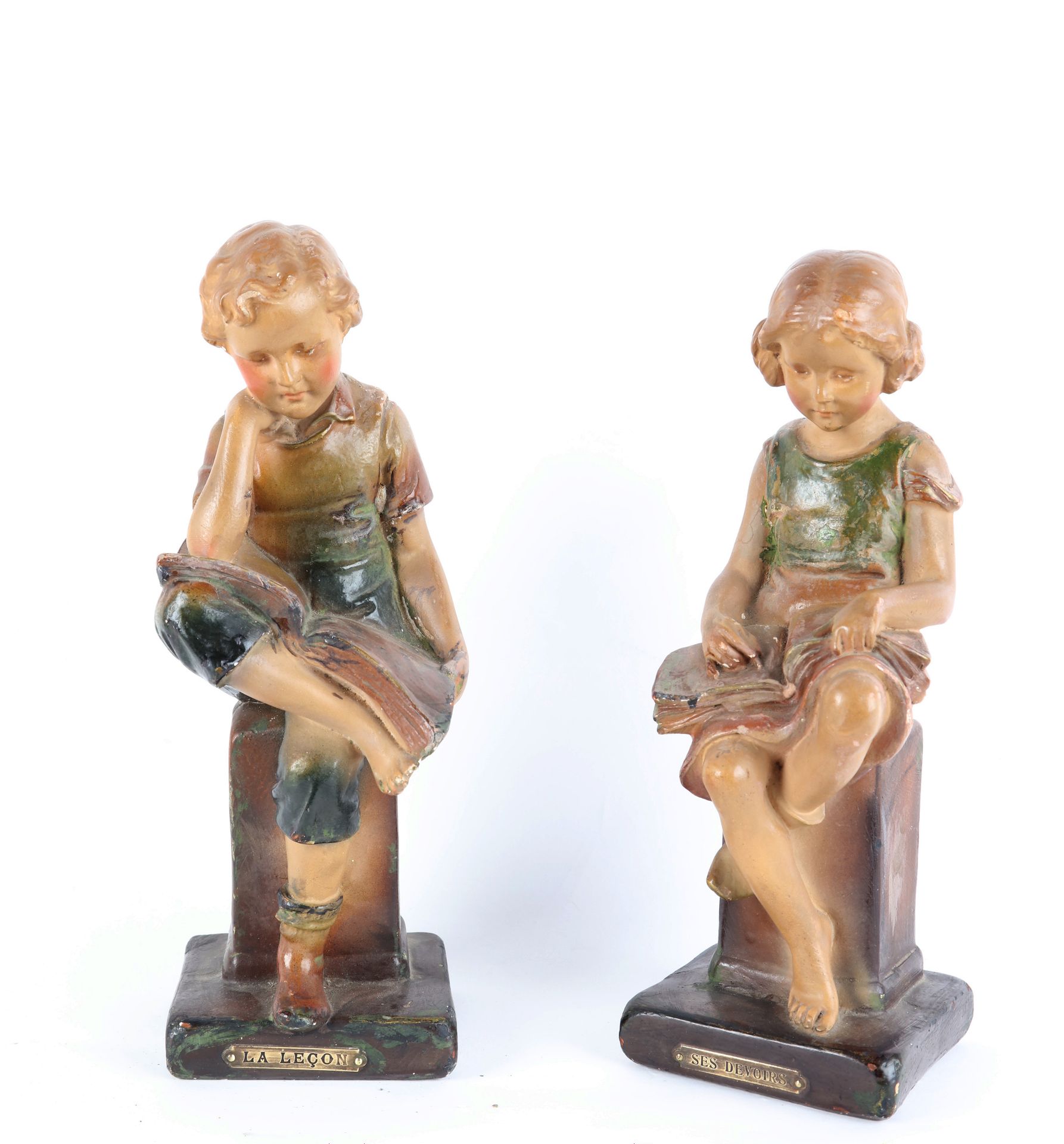 Null Pair of bookends, "the lesson" and "homework", plaster with polychrome pati&hellip;
