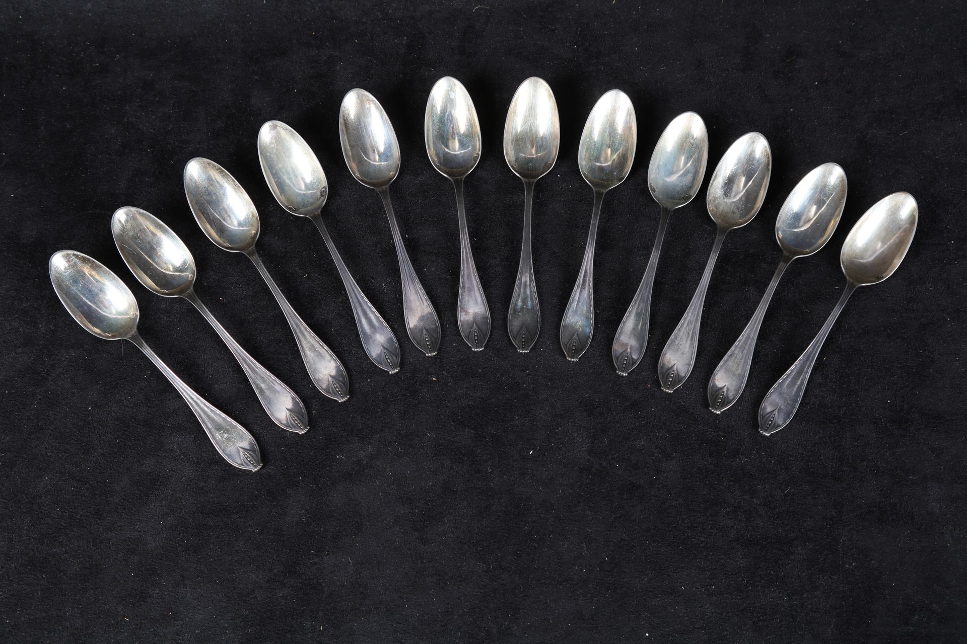 Null Case with 12 small silver spoons, pomegranate decoration, circa 1925, miner&hellip;