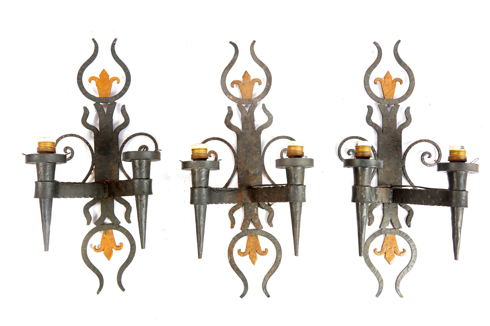 Null Suite of three wrought iron sconces with two arms of light, height : 63 cm