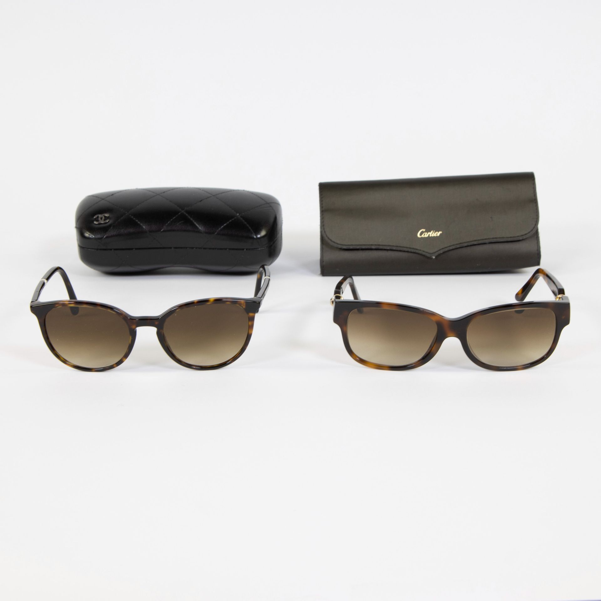 Lot of 2 Chanel and Cartier sunglasses with matching gla…