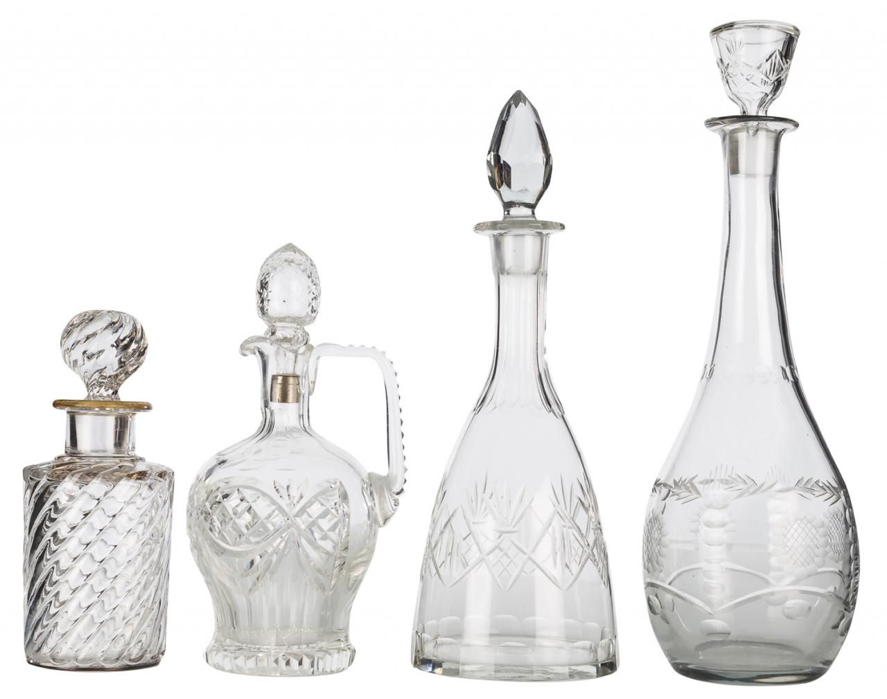 Null Lot of four bottles with glass stopper with carved decoration. S. XX

Max h&hellip;