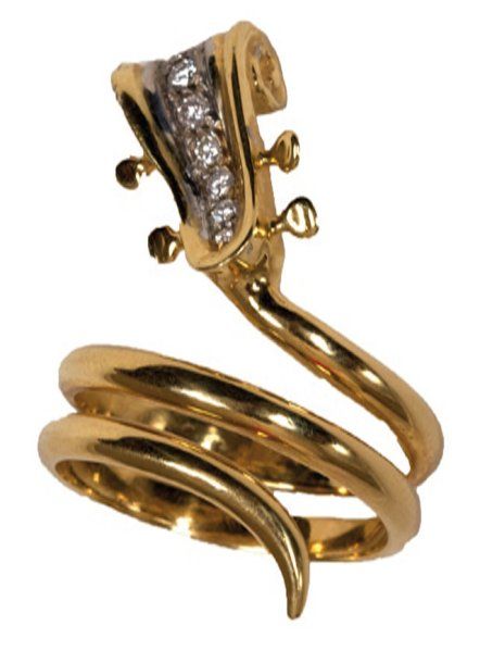 ARMAN (1928-2005) Bague serpent en or jaune, décorée d'une crosse de violon ponc&hellip;