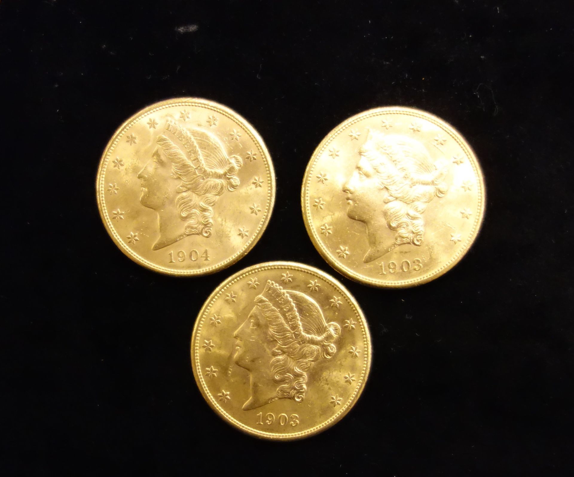 Null Tre monete d'oro da 20 US.
Peso: 100,25 g