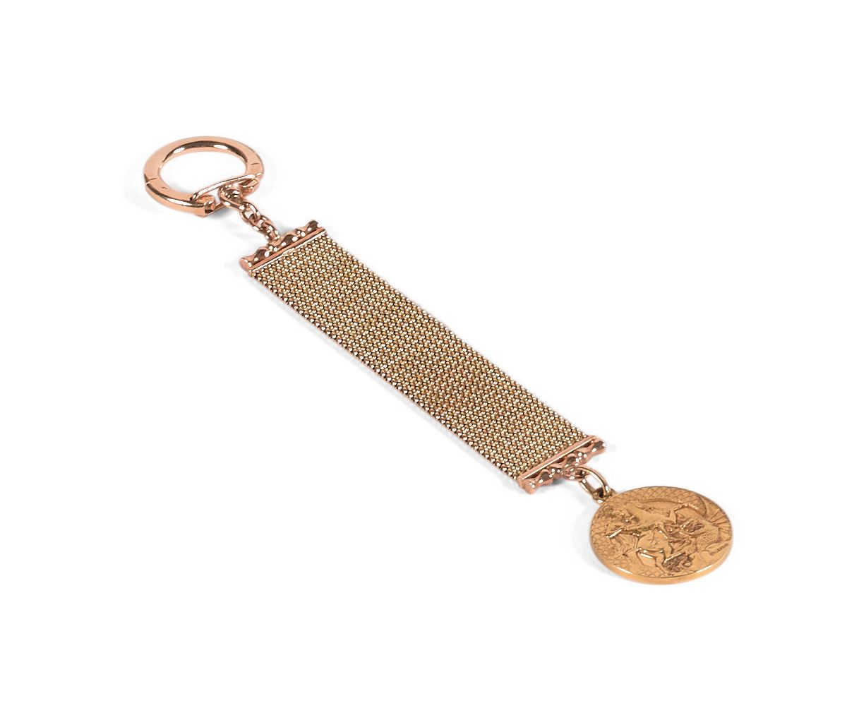 Null 18K (750‰) yellow gold key ring, with braided links holding a medal with th&hellip;