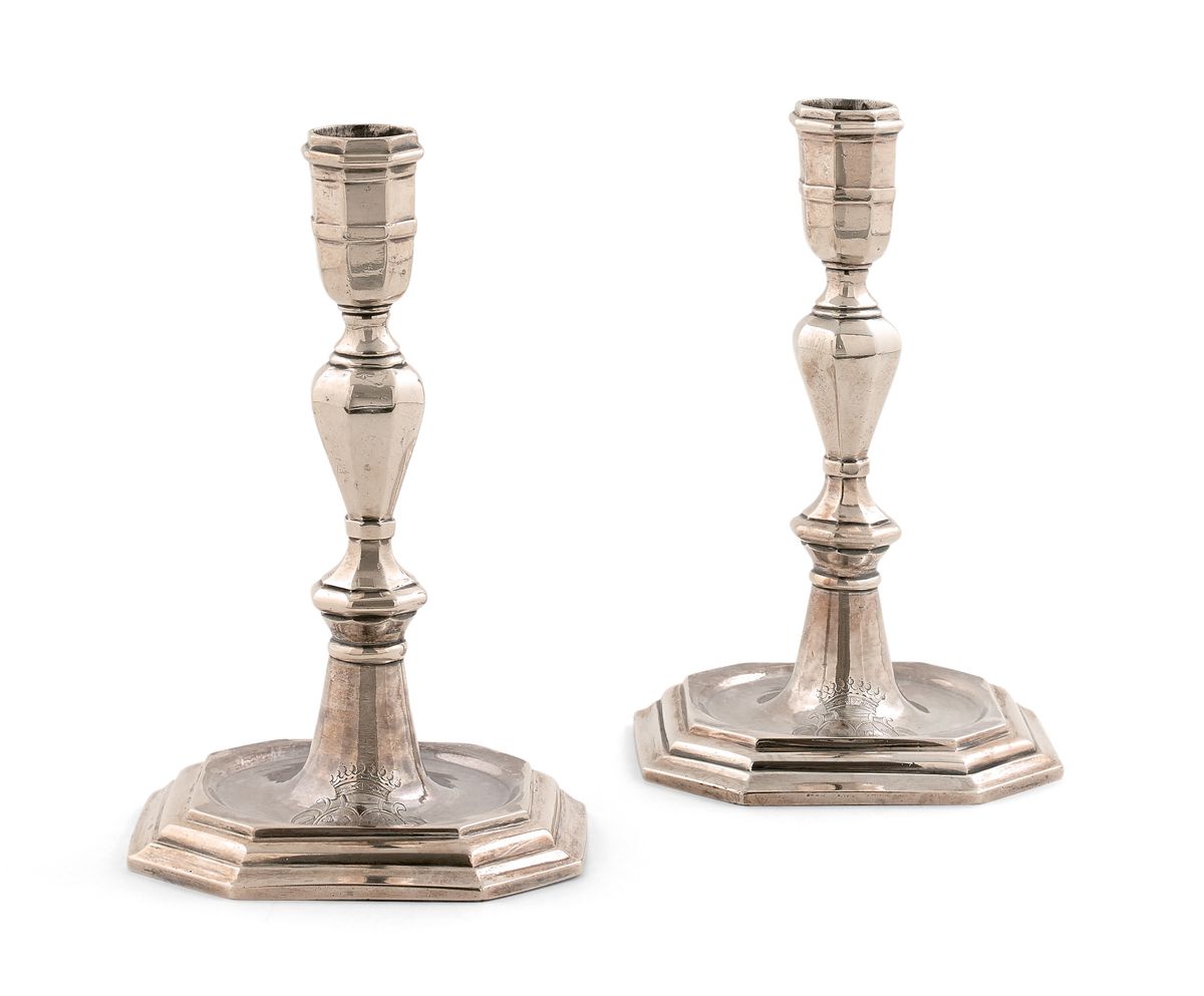 Null Pair of silver torches, the octagonal base with springs, the baluster shaft&hellip;
