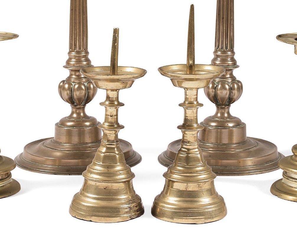 Null Pair of turned brass candlesticks with circular bases resting on three smal&hellip;