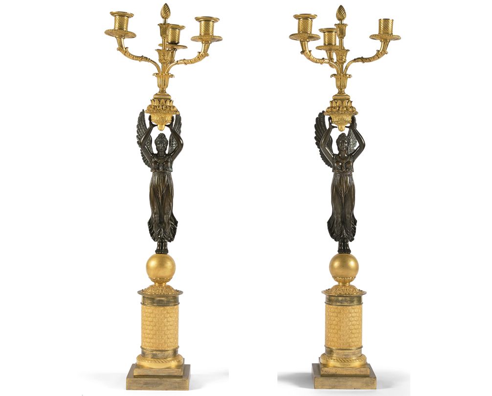 Null Pair of torchères in chased bronze with patina and gilt. The bouquet of thr&hellip;