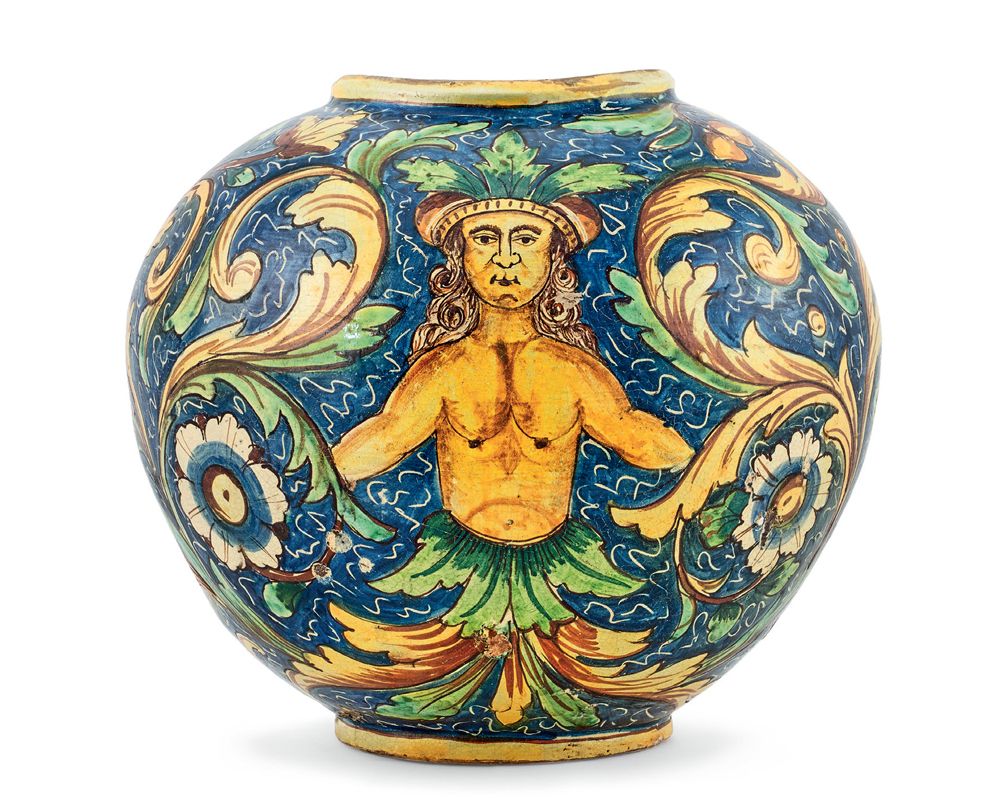 CALTAGIRONE (Sicile) 一个多色的蓝底半身像和大花棕榈装饰的玛瑙球花瓶。
18世纪。
高度：32厘米