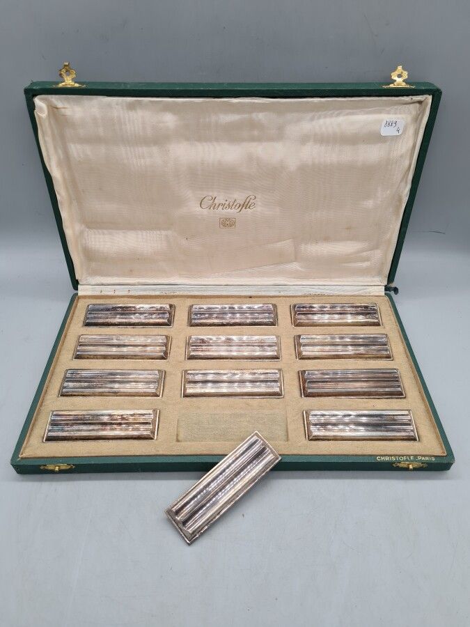 Null CHRISTOFLE, 12 portacoltelli in argento Art Deco, nella loro scatola.