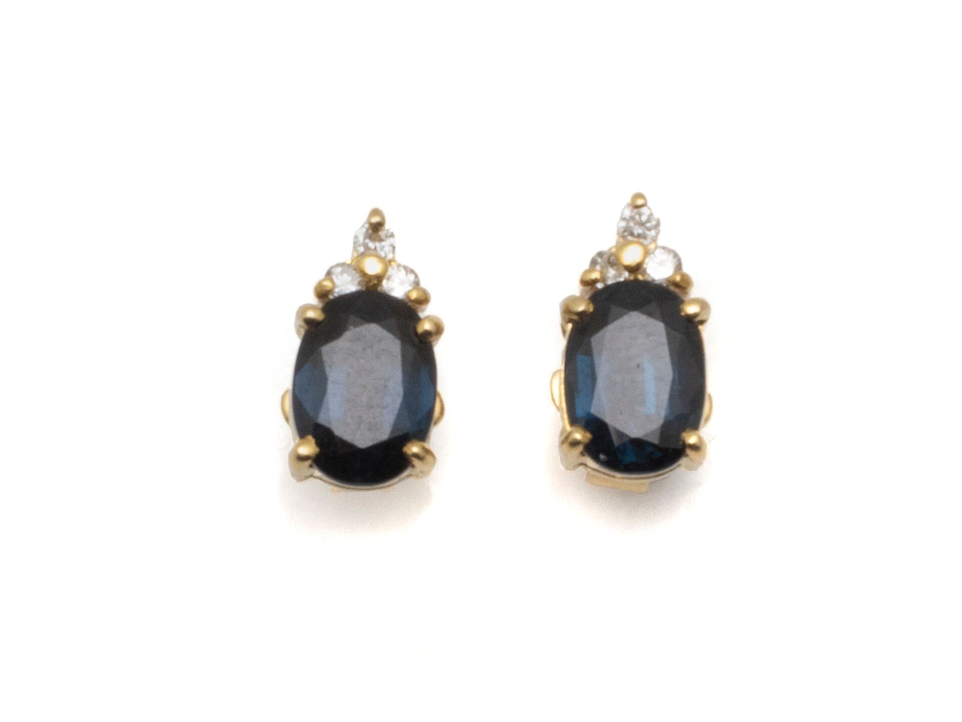 Null Pair of 750 thousandths gold earrings set with oval faceted sapphires, enha&hellip;