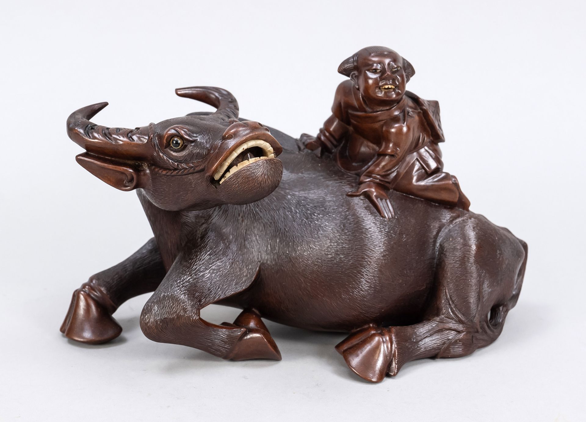 Null Child on a water buffalo, China, 1st h. 20th c., carving of dark, fine grai&hellip;