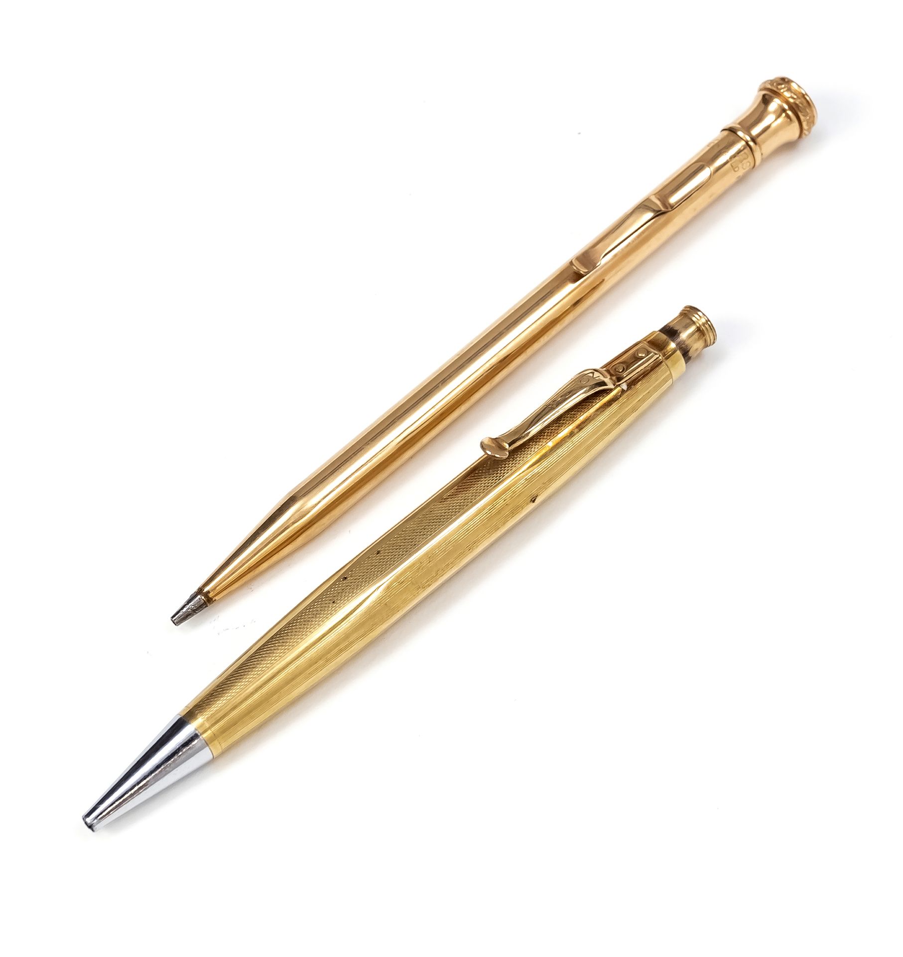 Null 推进铅笔和机械铅笔，20世纪下半叶，每个都有镀金的外壳，1倍凹陷，长分别为12和13.5厘米。