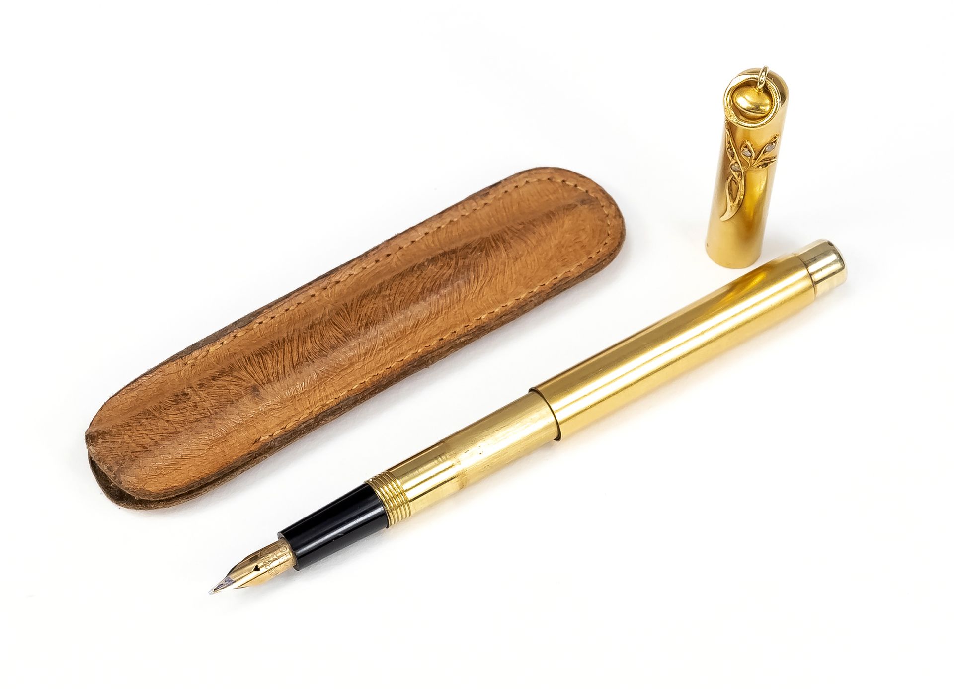 Null Small cartridge fountain pen, 2nd half of 20th c., 14 C (585) yellow gold n&hellip;