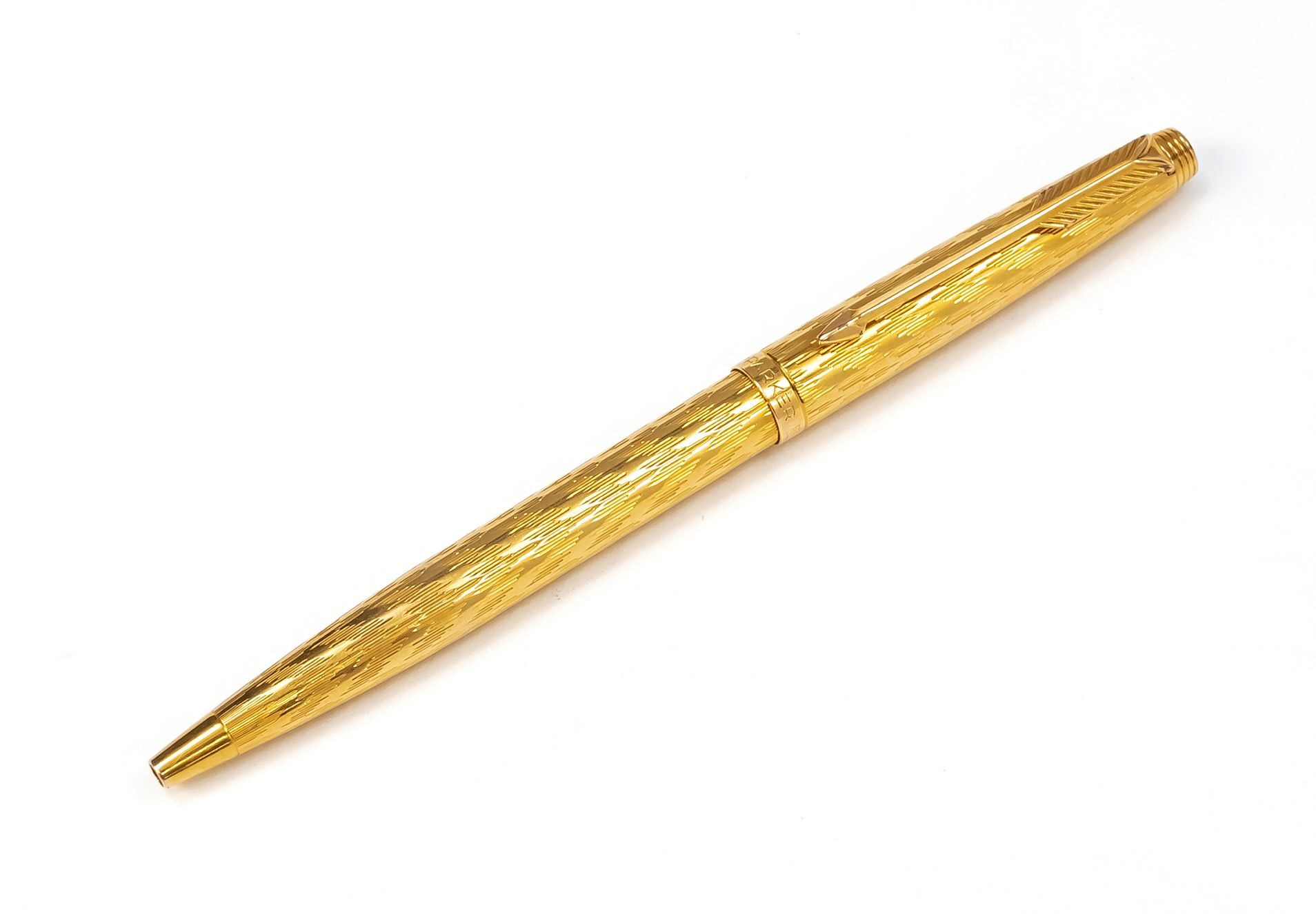 Null 帕克双头针，20世纪下半叶，法国制造，镀金外壳，有雕刻的装饰，长12.8厘米