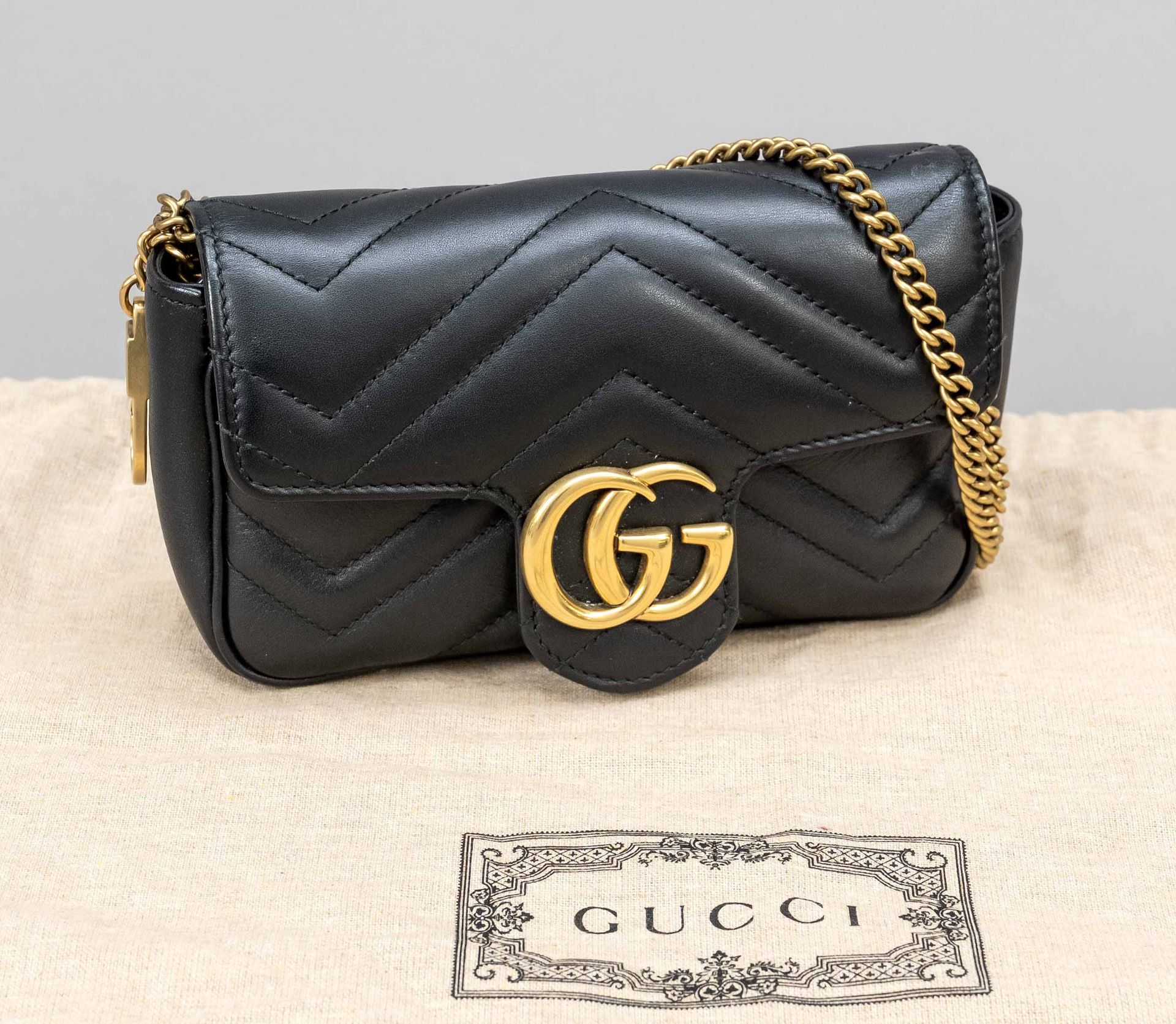 Gucci, GG Marmont Super-Mini Matelasse Leather Bag, blac…