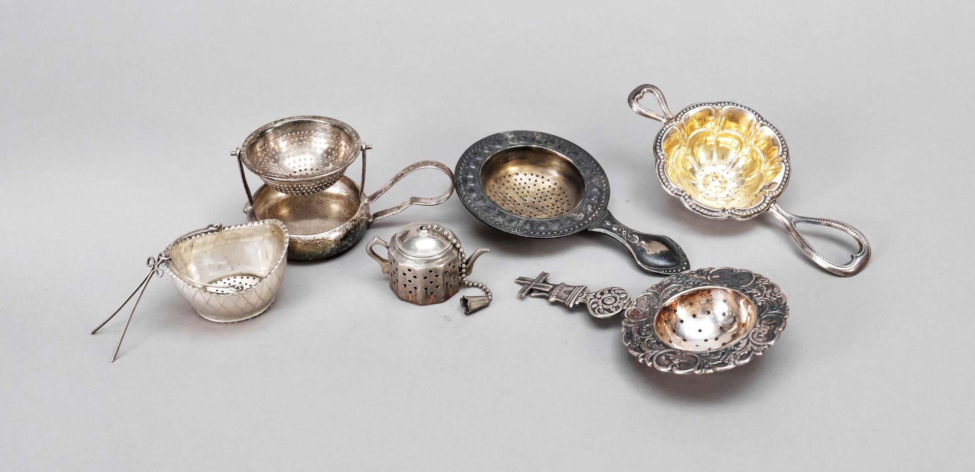 Null Group of six tea strainers, 20th century, different makers, plated, various&hellip;