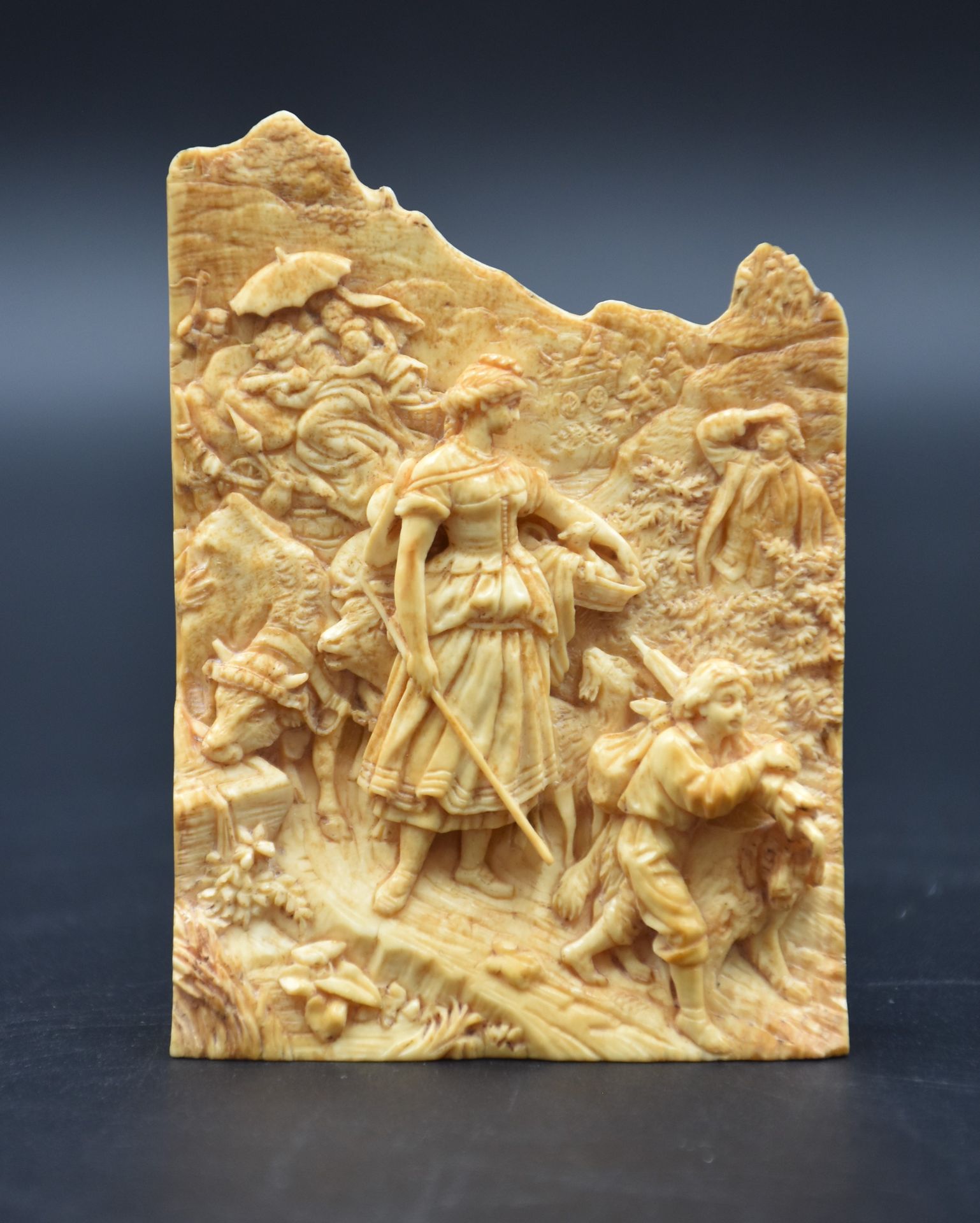 Null Relief in ivory representing a family of shepherds in the mountain. Work en&hellip;