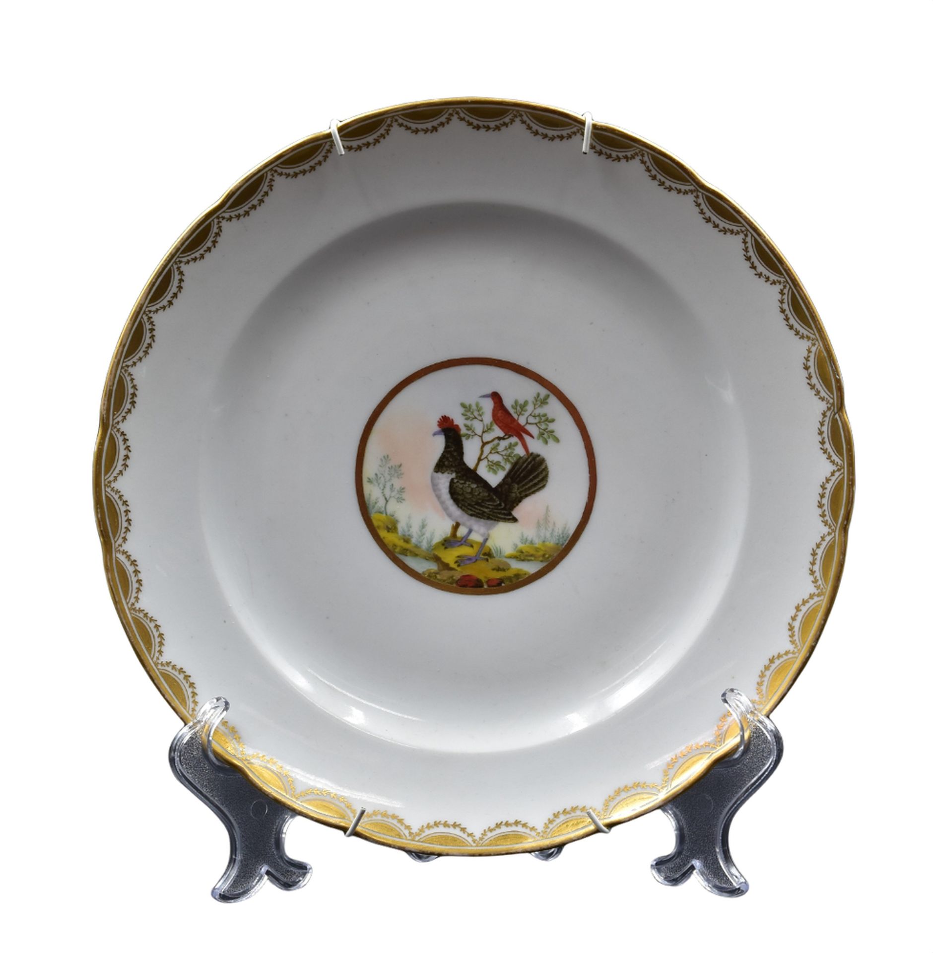 Null Porcelain plate late 18th century with polychrome decoration of birds. 

NL&hellip;