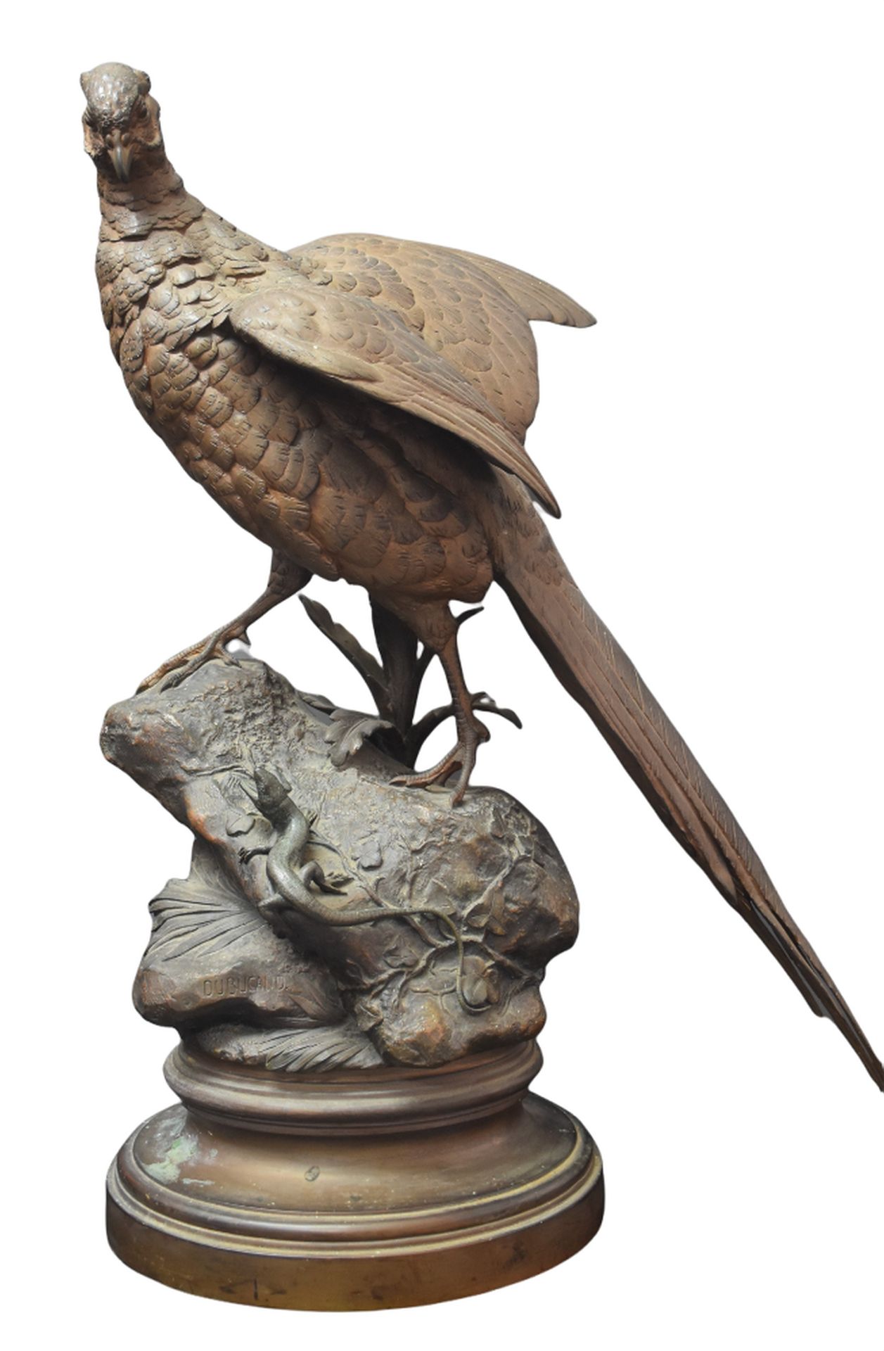 A. DUBUCAND ( 1828-1894). A.杜布坎德（1828-1894）。铜制野鸡和蜥蜴。底部有几处氧化的痕迹。高度：70厘米。 

NL：A。杜&hellip;