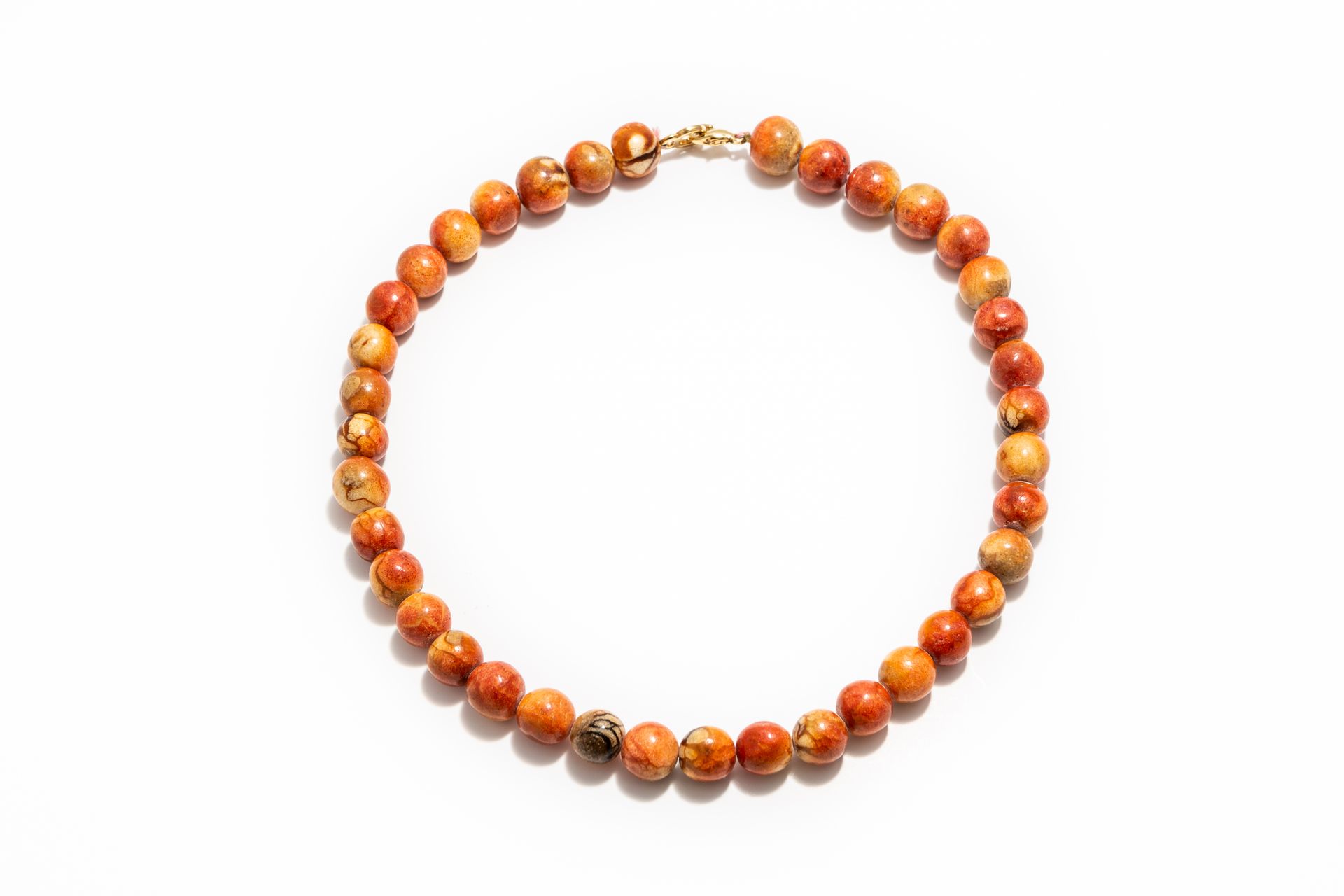 Null Necklace of pressed coral pearl

Gross weight : 118 g.