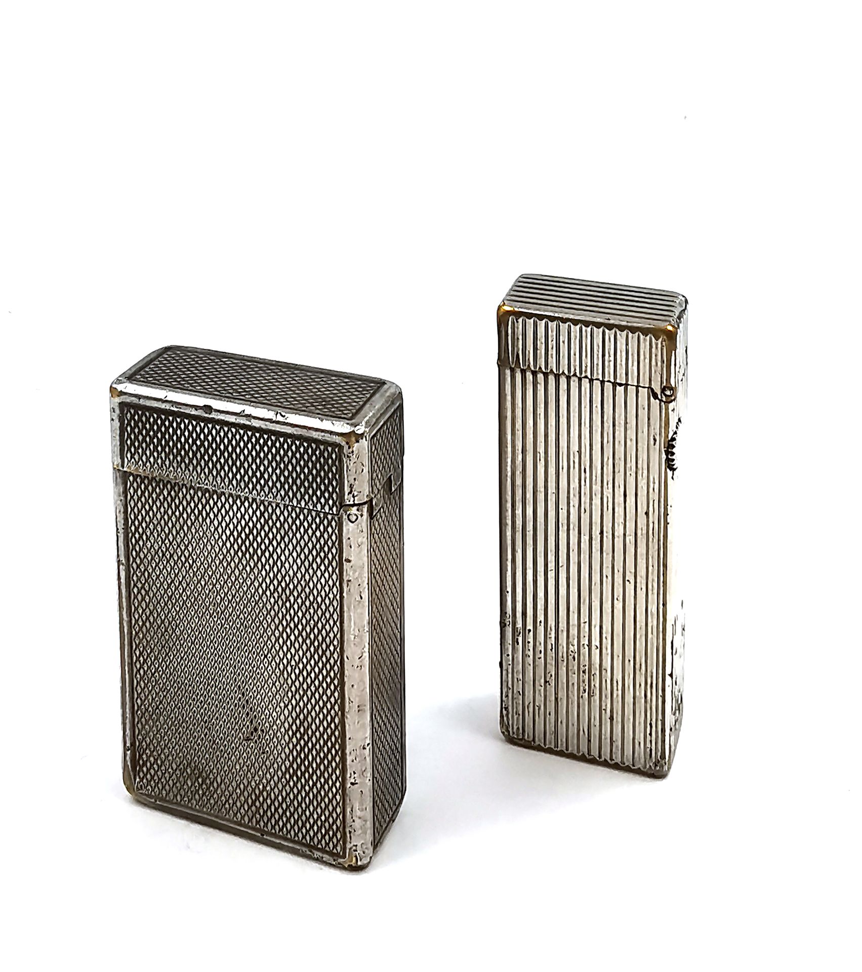 Null House ST DUPONT and House DUNHILL

Two silver plated lighters, one with a d&hellip;