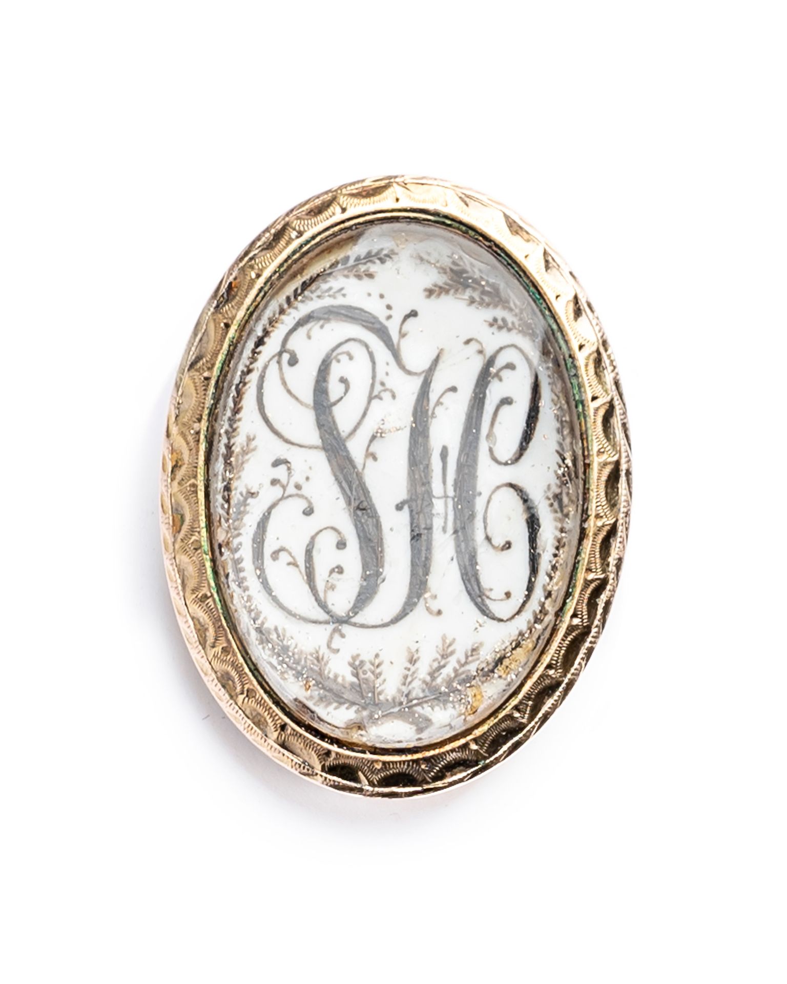 Null 18K黄金（千分之七十五）哀悼戒指的元素，表圈是椭圆形的珐琅，装饰着头发，编号为 "TH"。
19世纪的作品
长度：2,2厘米
总重量：2.6克。