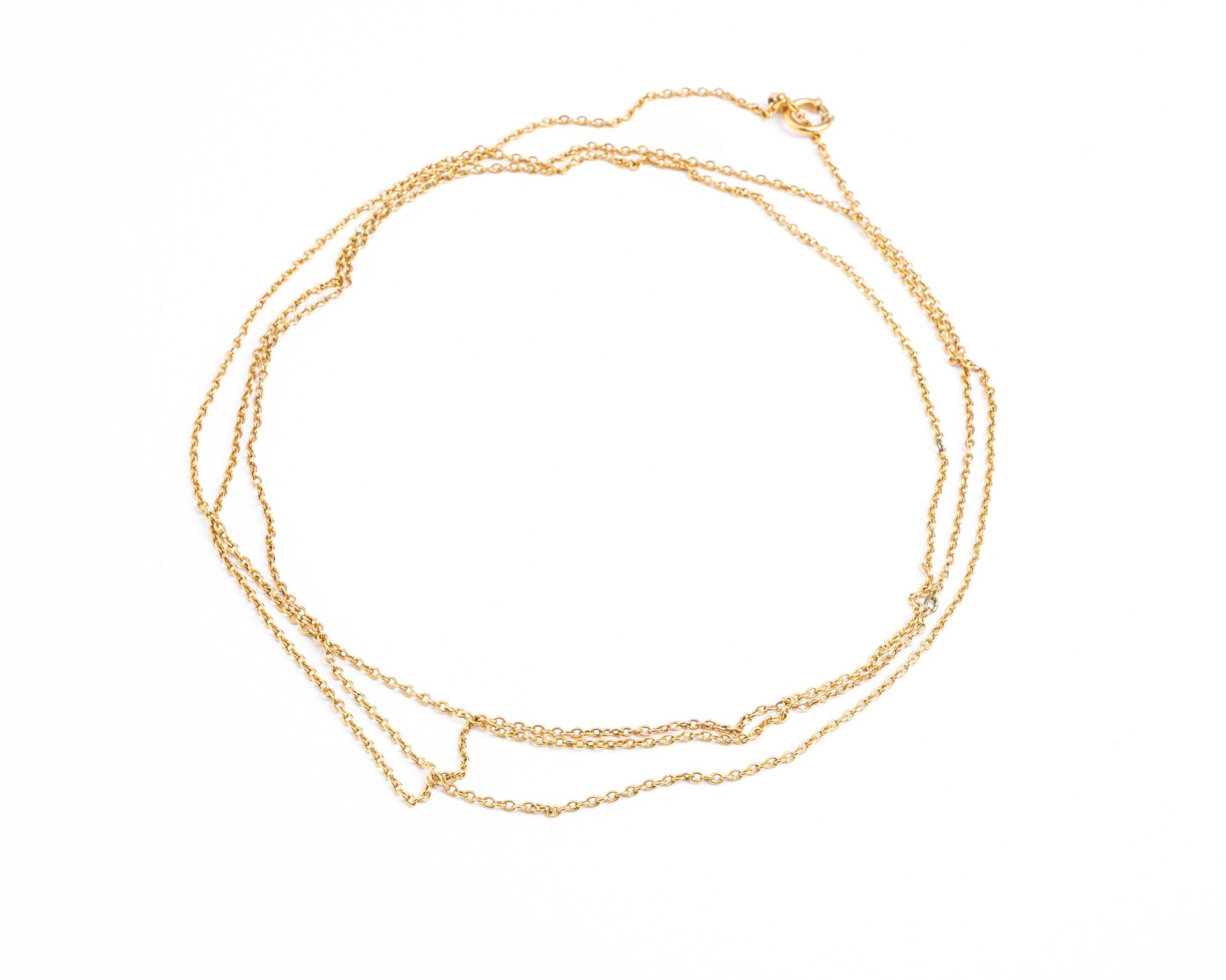 Null 18K（750千分之一）黄金双排链，forçat链接
三个链接被镀金金属取代
长度：78厘米
毛重 : 9,9 g.