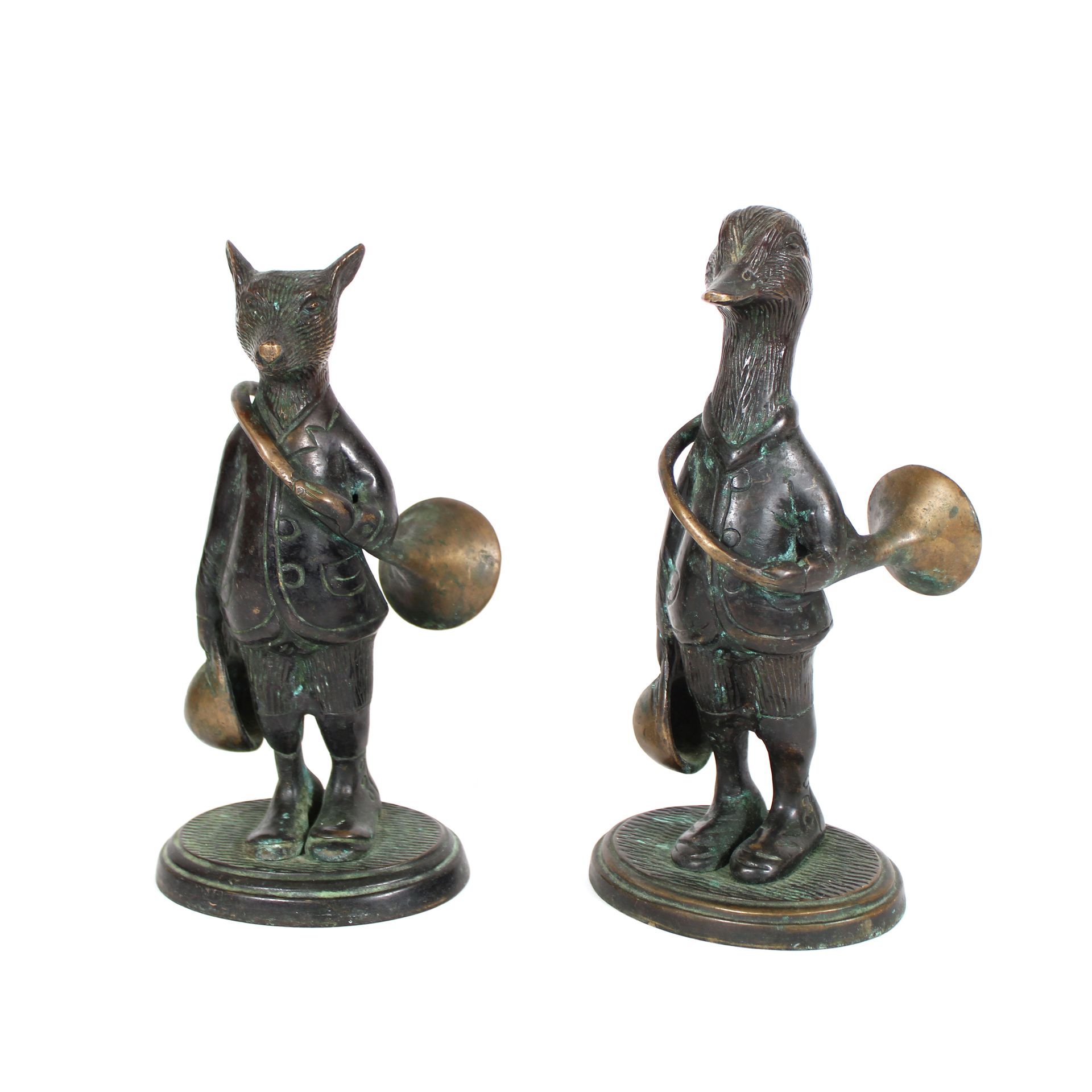Null Ein Paar Bronzekarikaturen mit nuancierter Patina, die eine Ente und einen &hellip;