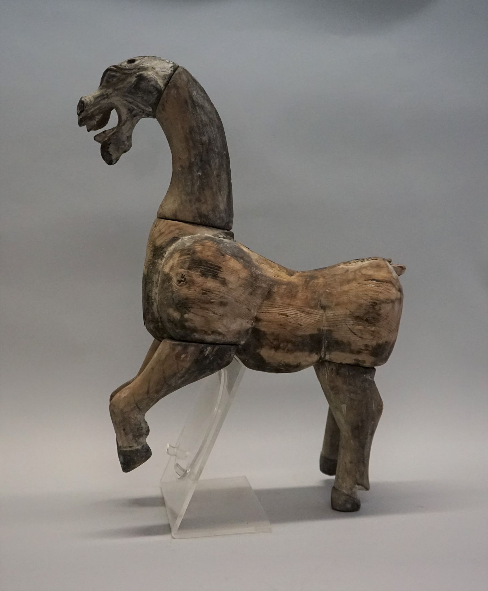 Null Horse shown prancing in natural wood. Han style (China)

38x38cm