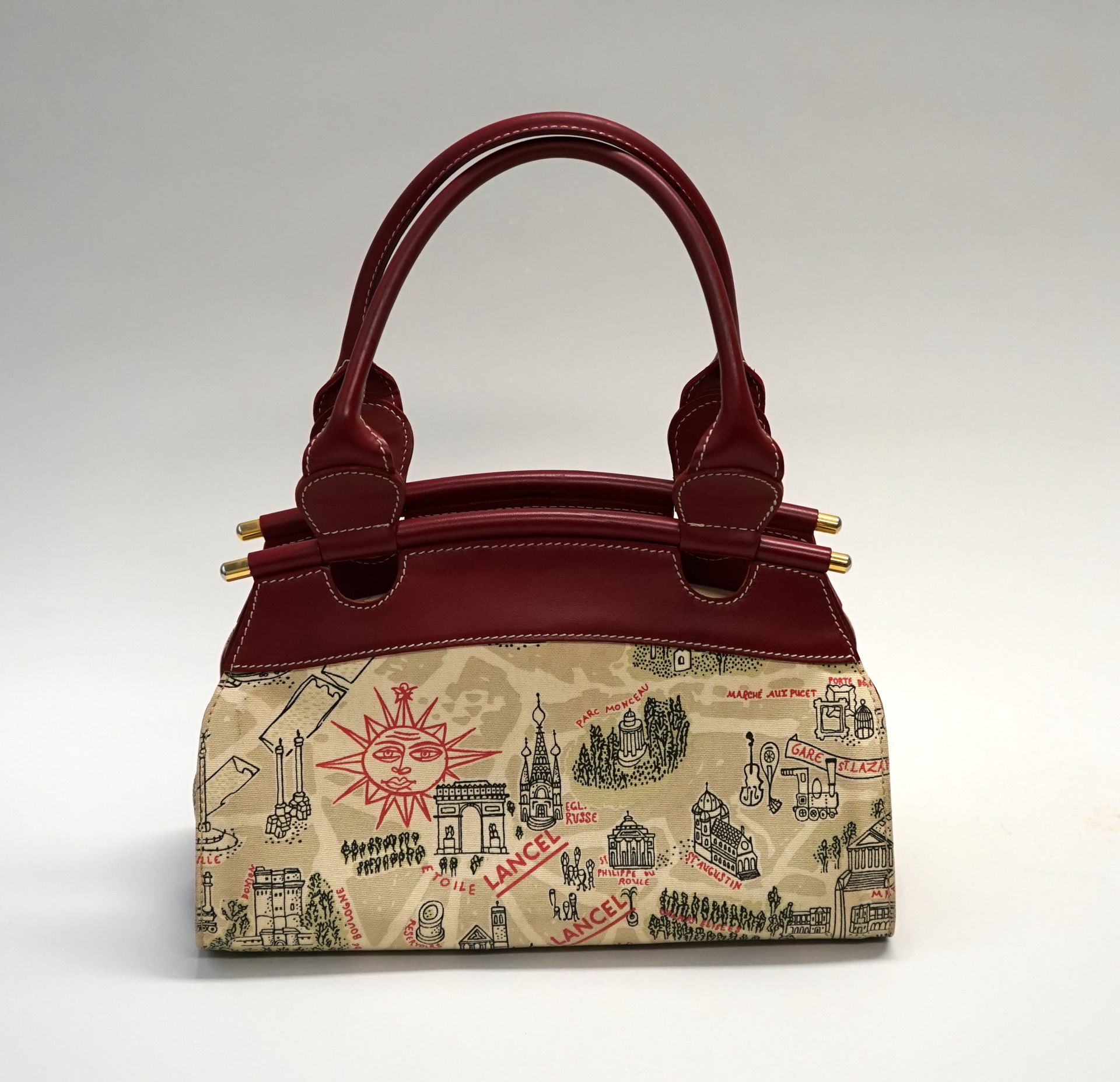 Null LANCEL - Vintage "Paris" line handbag in printed canvas and red leather. Ve&hellip;